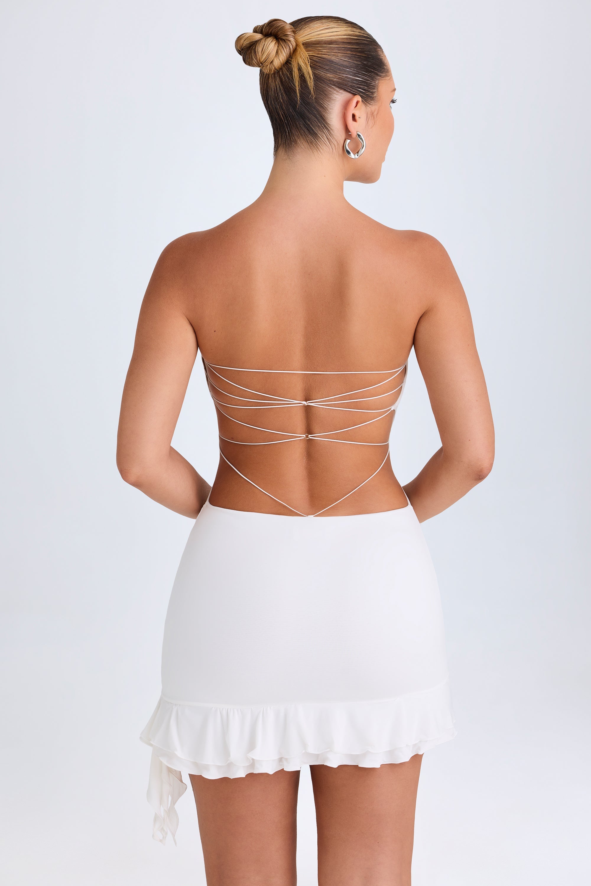 Misa Ruffle-Trim Cut-Out Bandeau Mini Dress in White - Image 2
