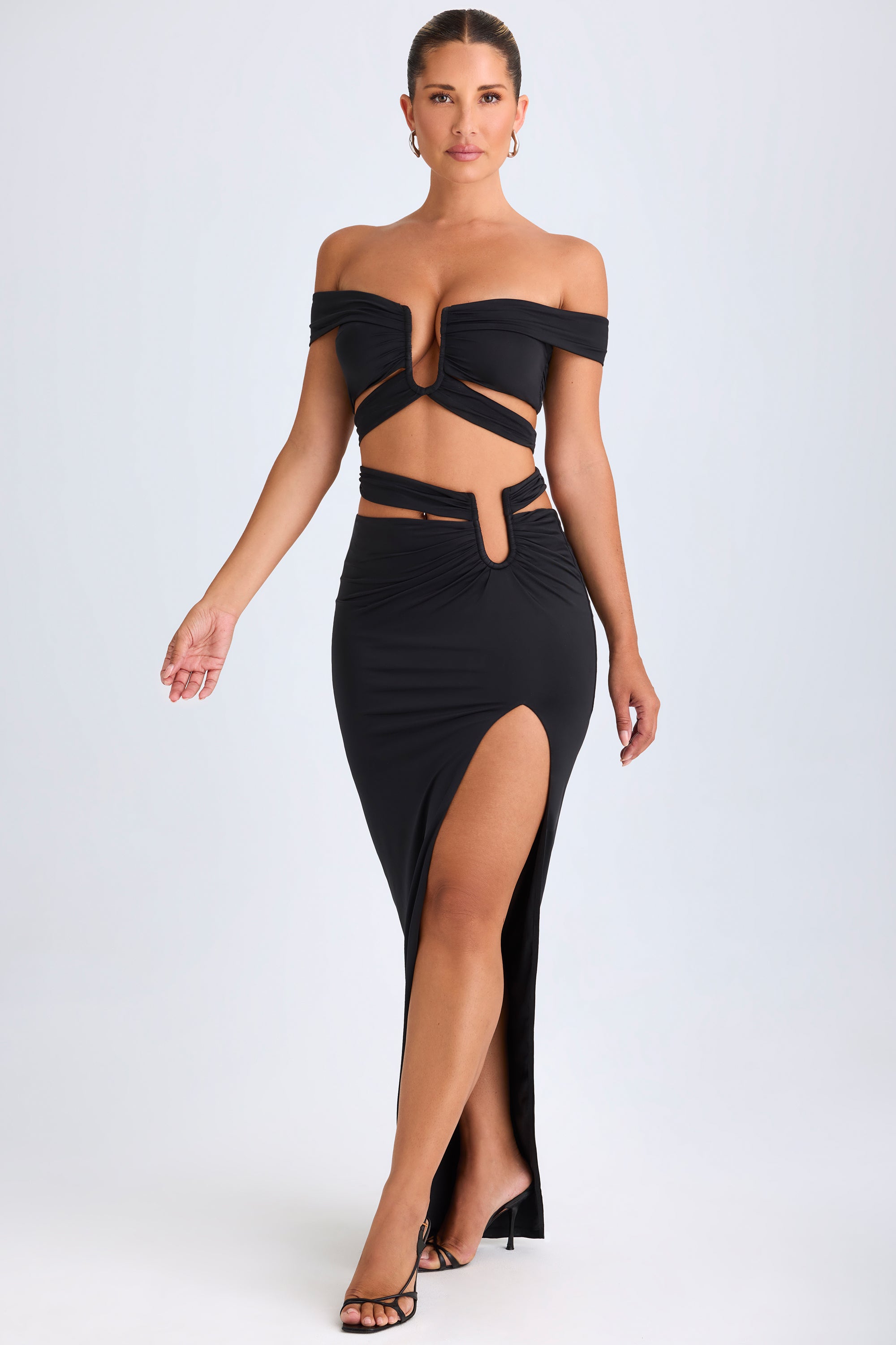 Urara Asymmetric Cut-Out Maxi Skirt in Black