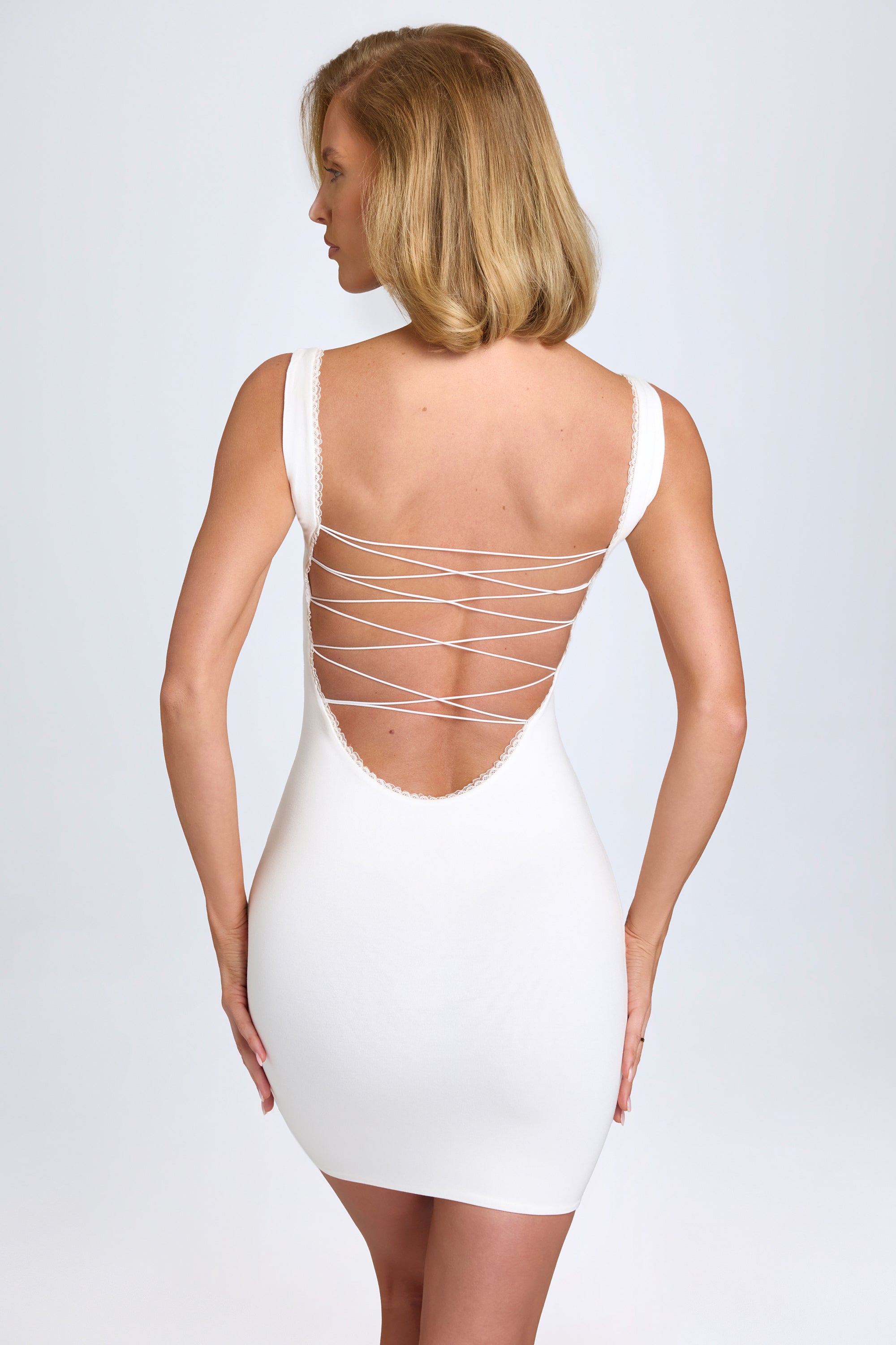 Aoife Modal Lace-Trim Bodycon Mini Dress in White - Image 4