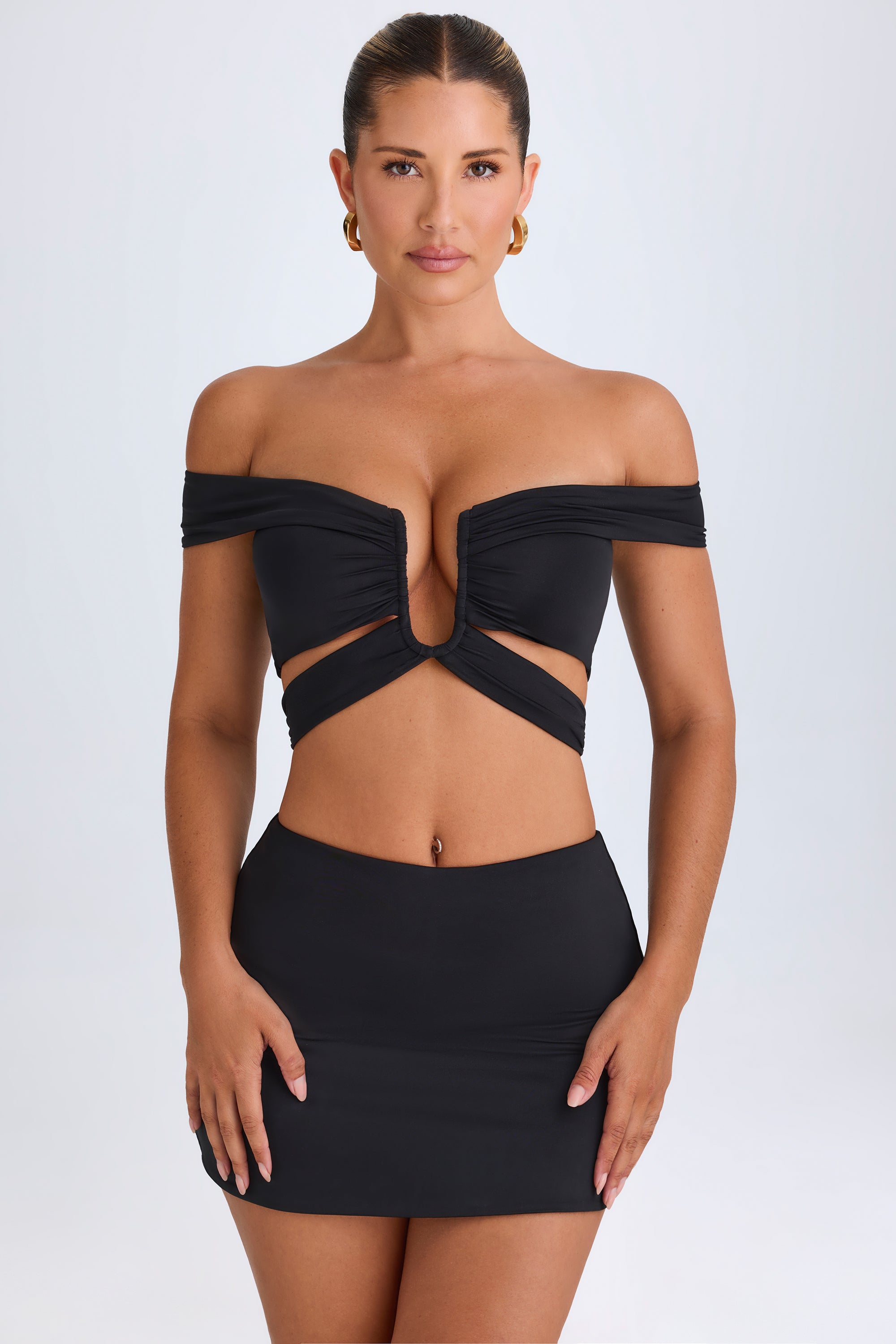 Nazli Mid-Rise Micro Mini Skirt in Black