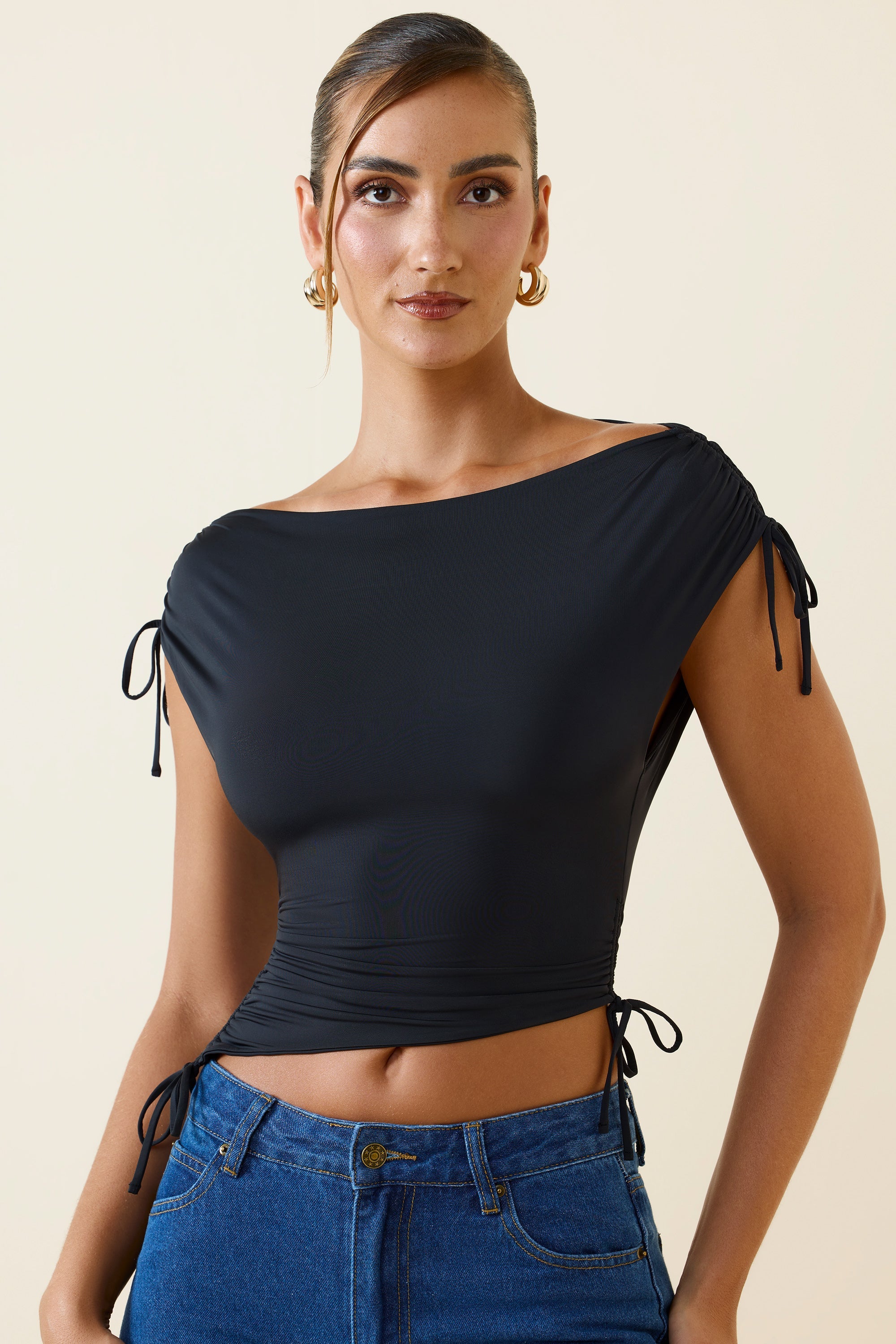 Kaede Asymmetric Ruched Cowl-Back Crop Top in Black - Image 6