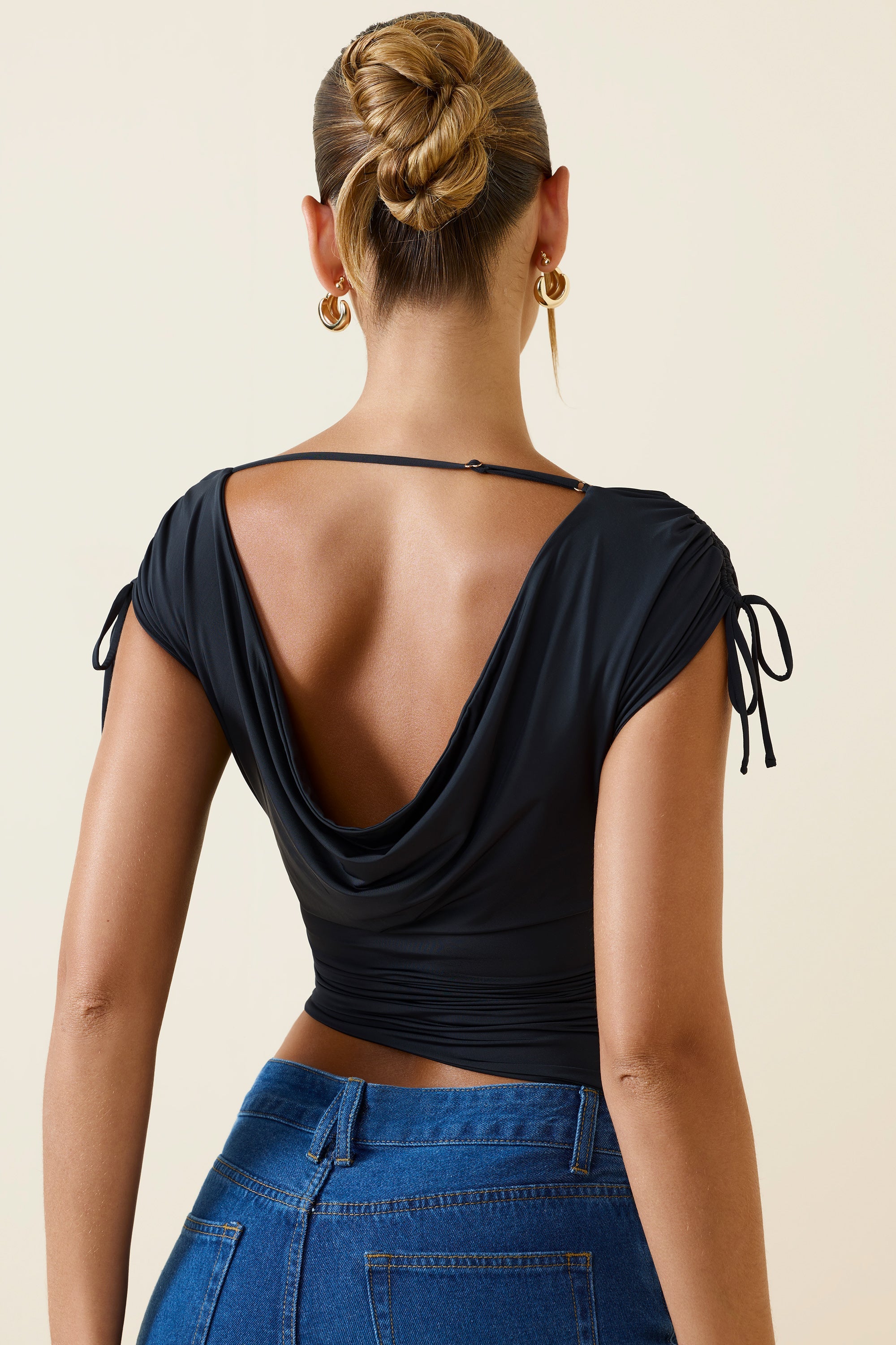 Kaede Asymmetric Ruched Cowl-Back Crop Top in Black - Image 2