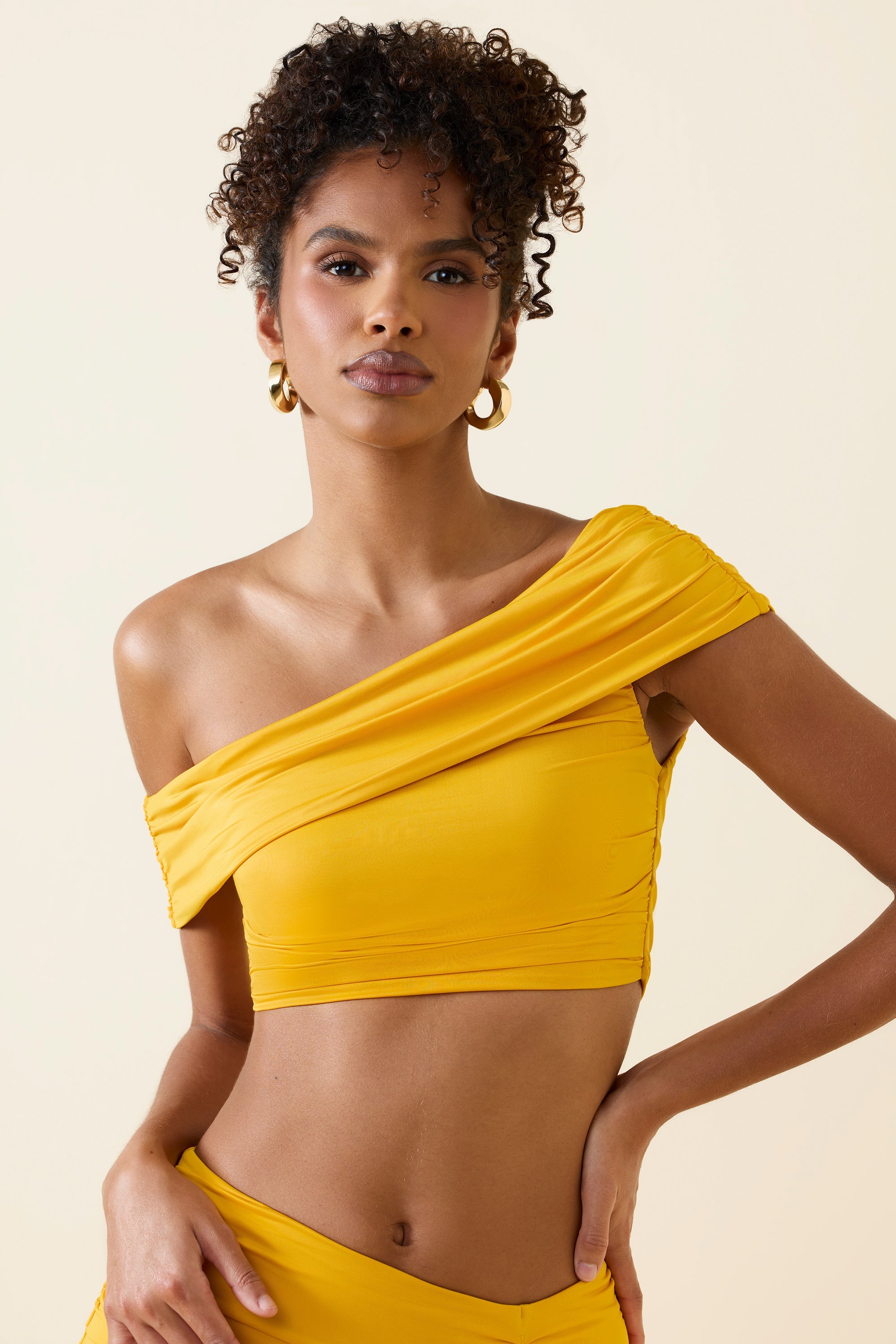 Inga Asymmetric Ruched Off-Shoulder Crop Top in Golden Yellow - Image 6