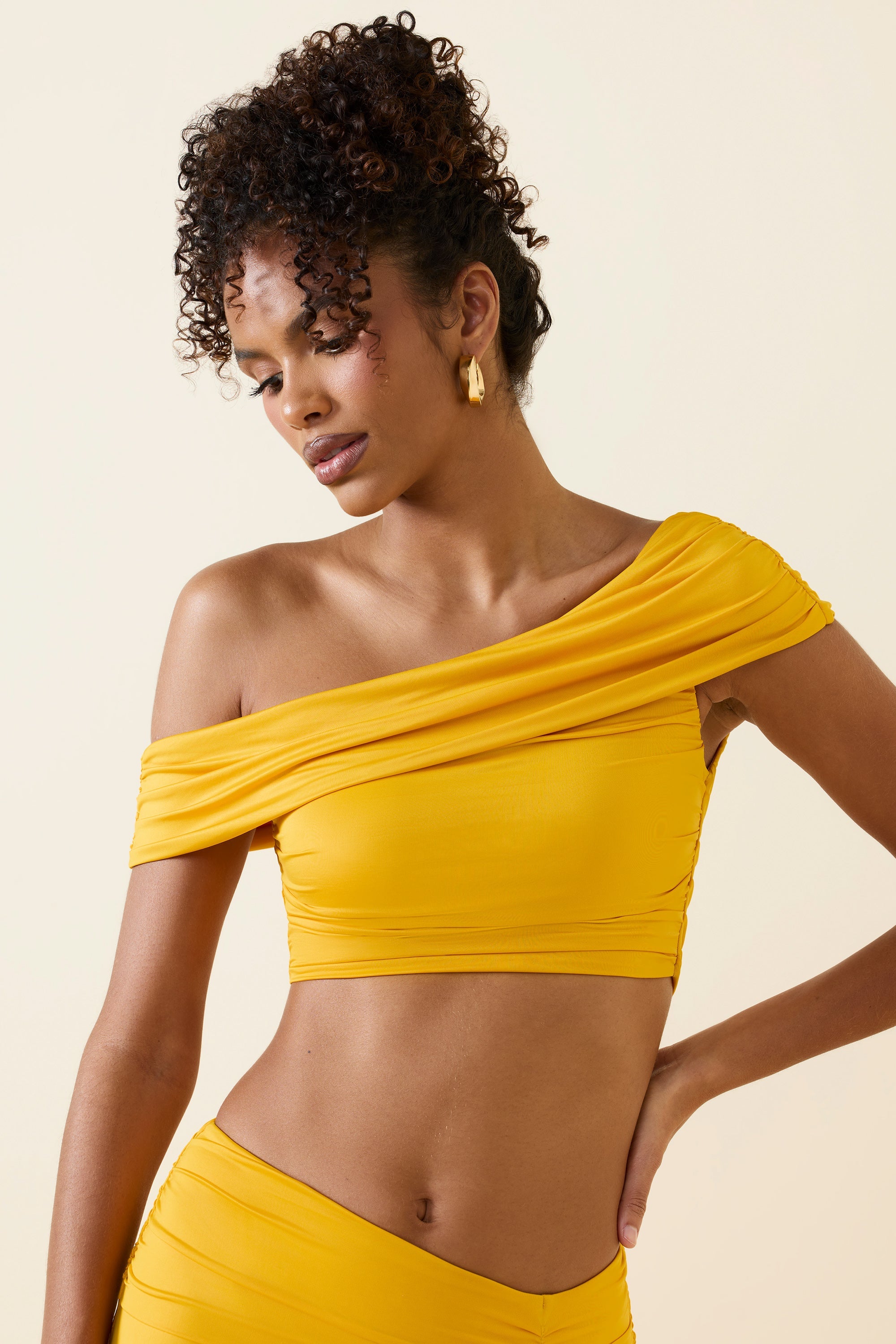 Inga Asymmetric Ruched Off-Shoulder Crop Top in Golden Yellow - Image 4