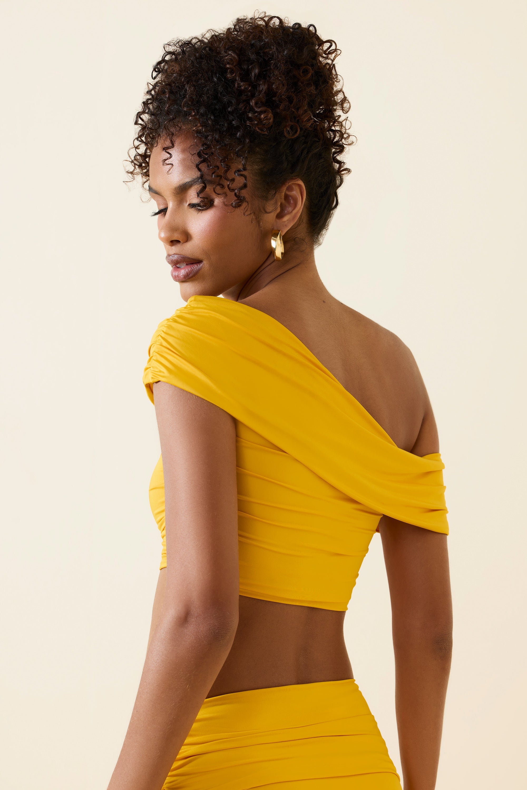 Inga Asymmetric Ruched Off-Shoulder Crop Top in Golden Yellow - Image 5