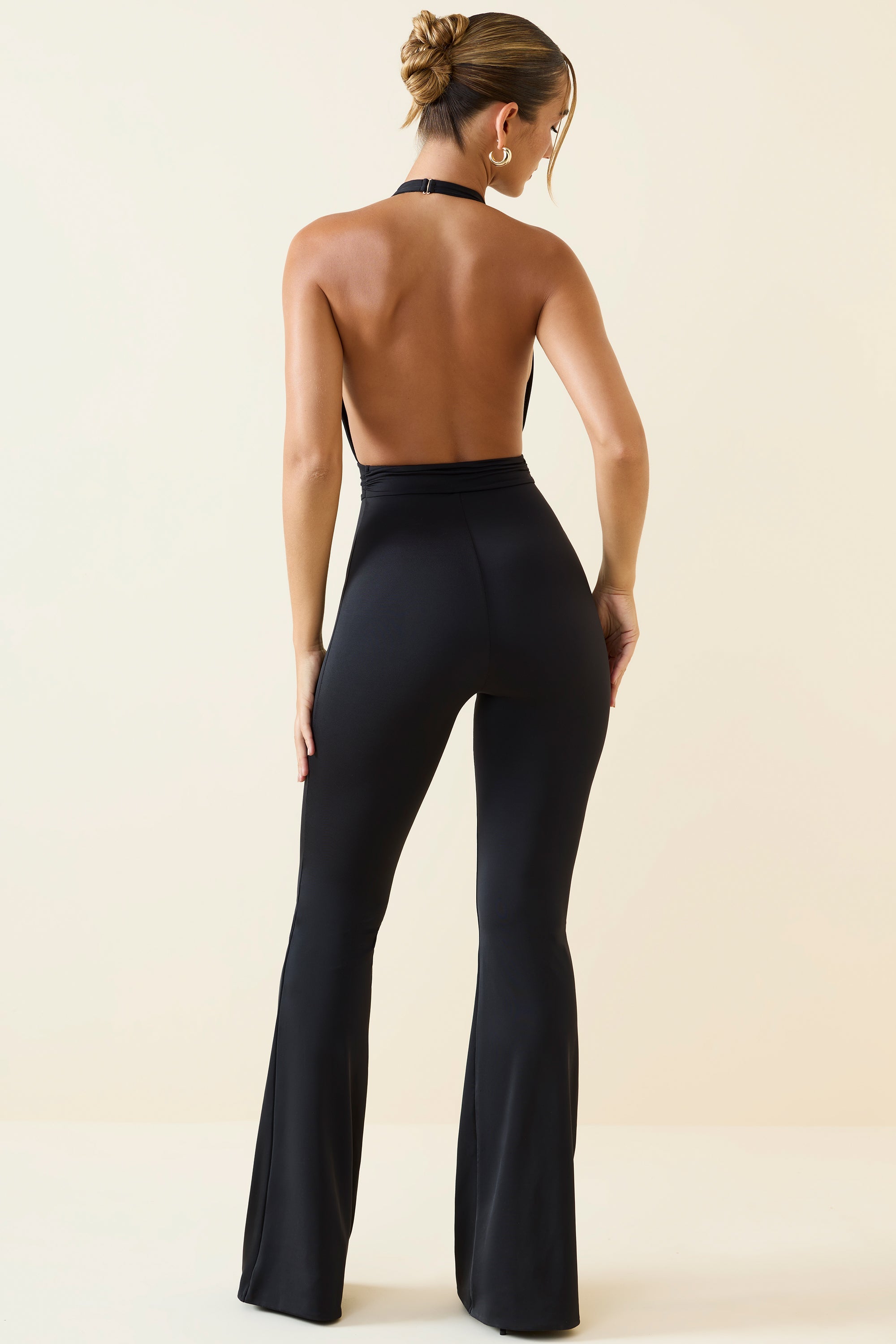 Zenaida Halterneck Cut-Out Flared Jumpsuit in Black - Image 2