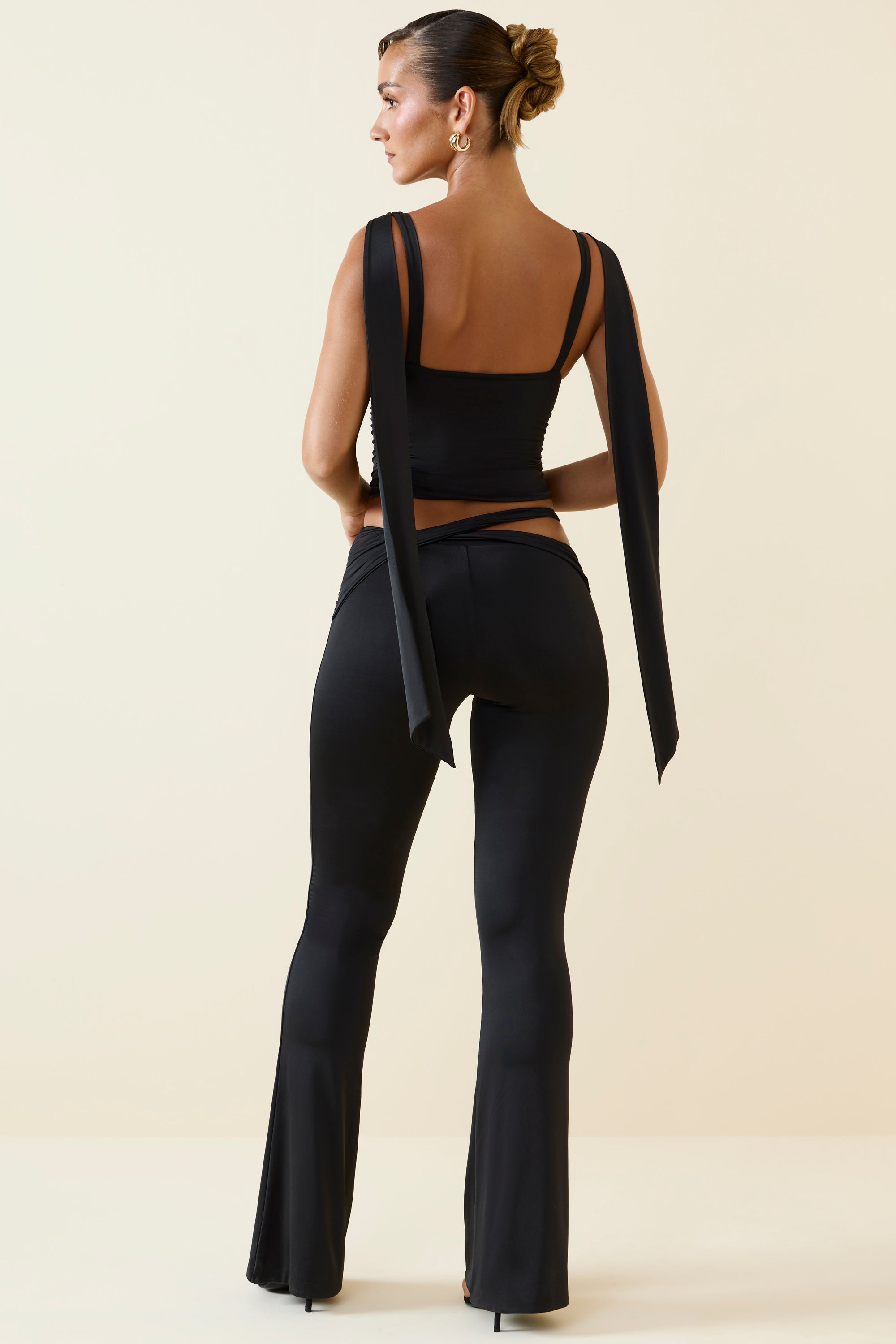 Shadi Cut-Out Mid-Rise Flared Trousers in Black - Image 2