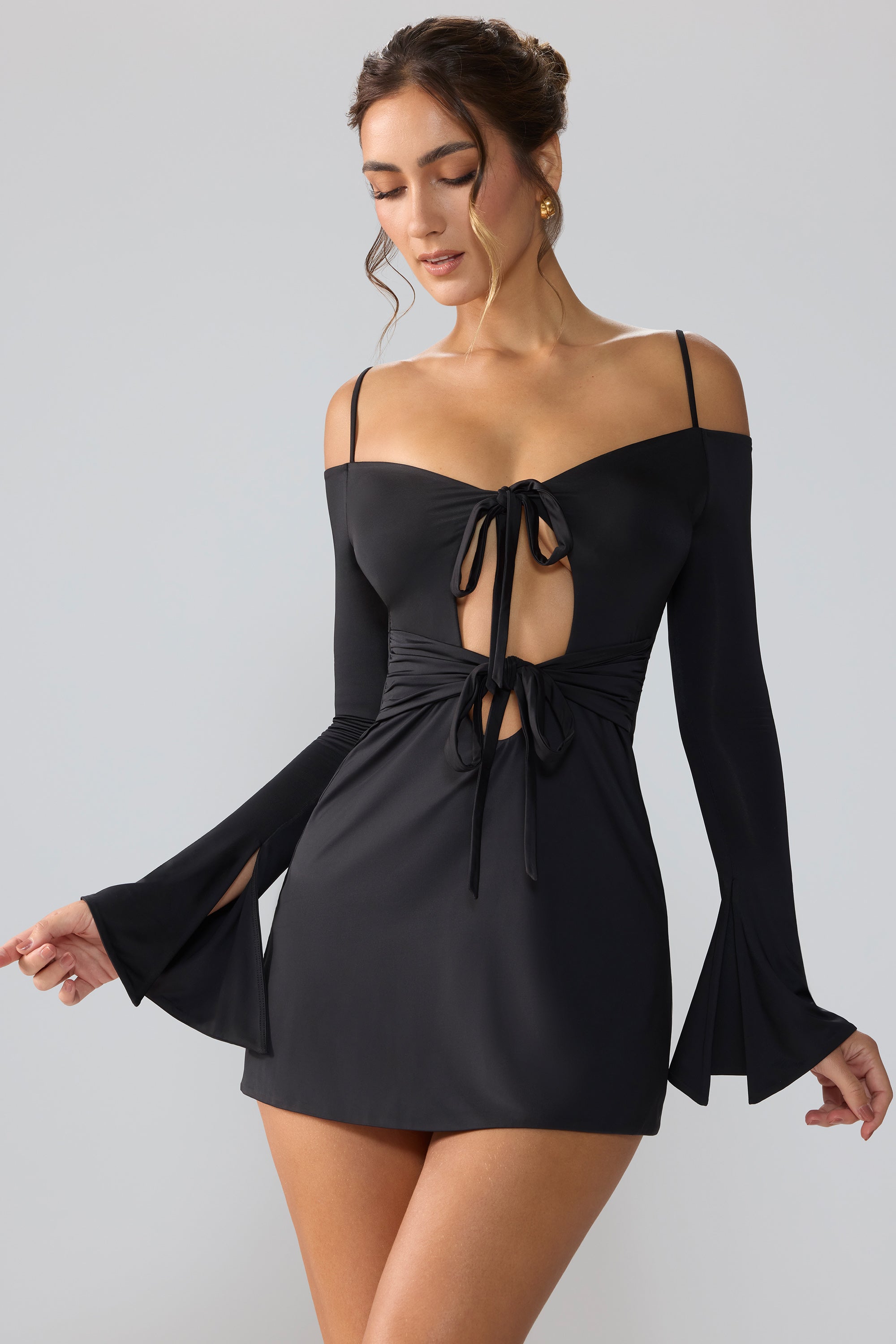 Sidney Slinky Jersey Long Sleeve Cut Out A-Line Mini Dress in Black