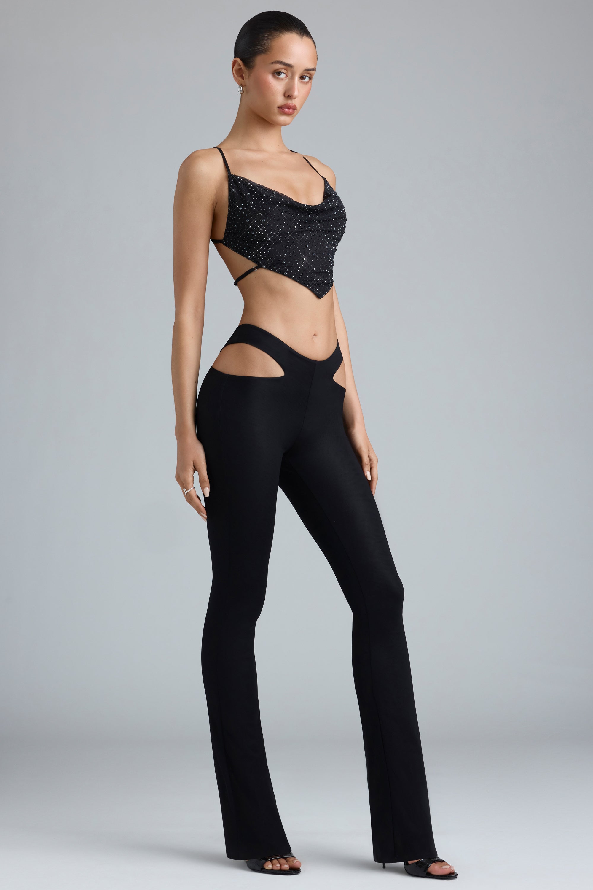 Harper Tall Metallic Cut-Out Low-Rise Flared Trousers in Black - Image 6