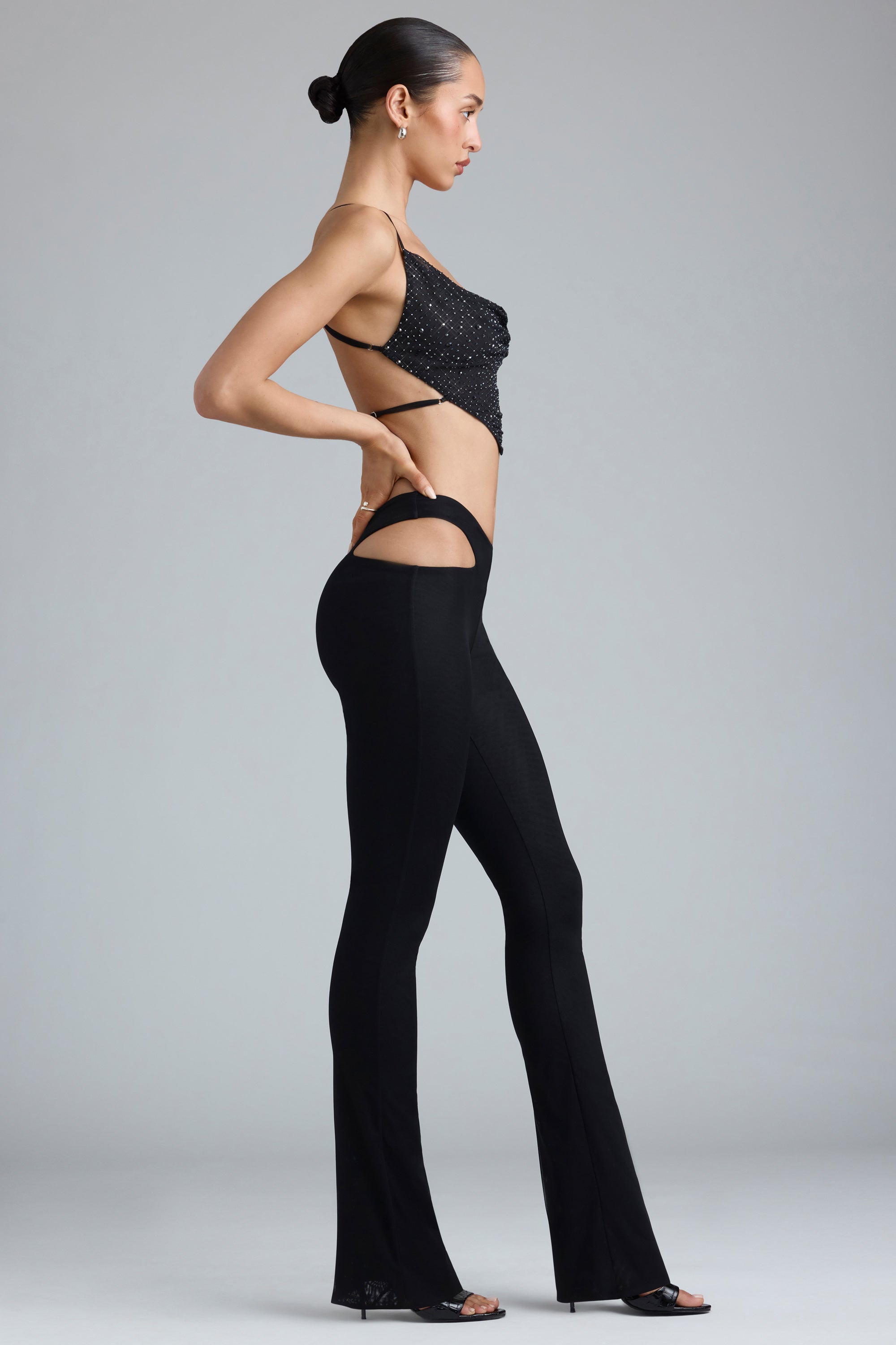Harper Tall Metallic Cut-Out Low-Rise Flared Trousers in Black - Image 3