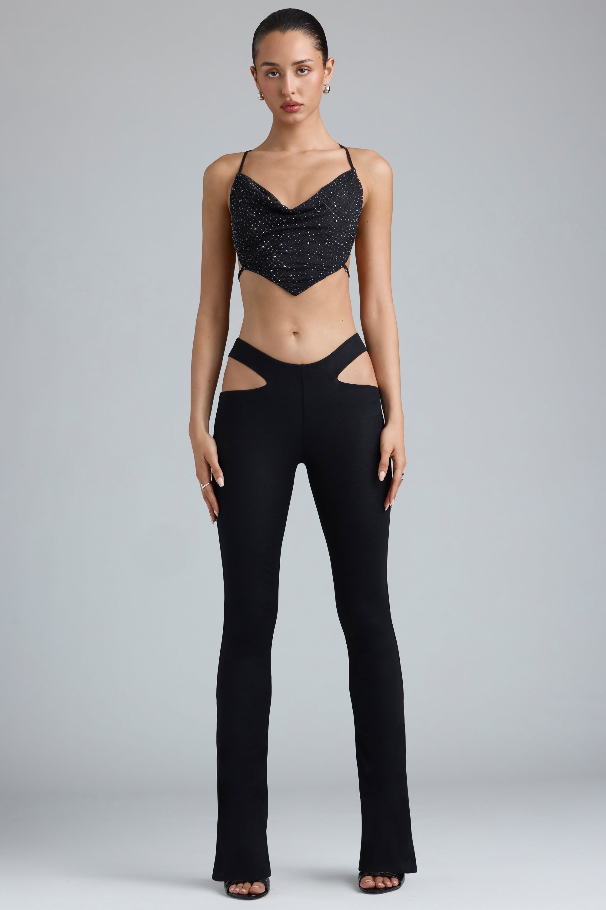 Harper Tall Metallic Cut-Out Low-Rise Flared Trousers in Black - Image 5