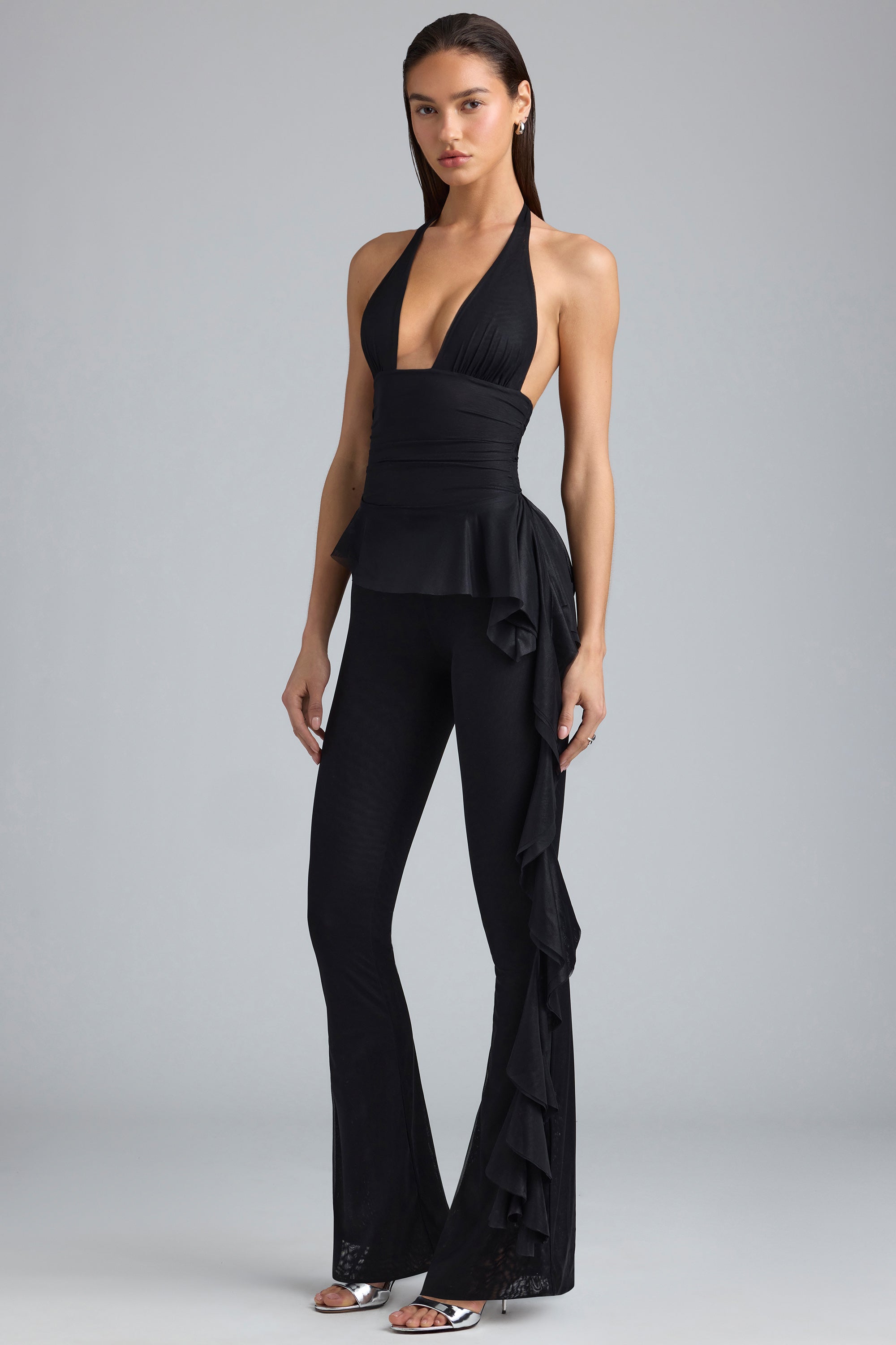 Reese Metallic Ruffle Low-Rise Flared Trousers in Black