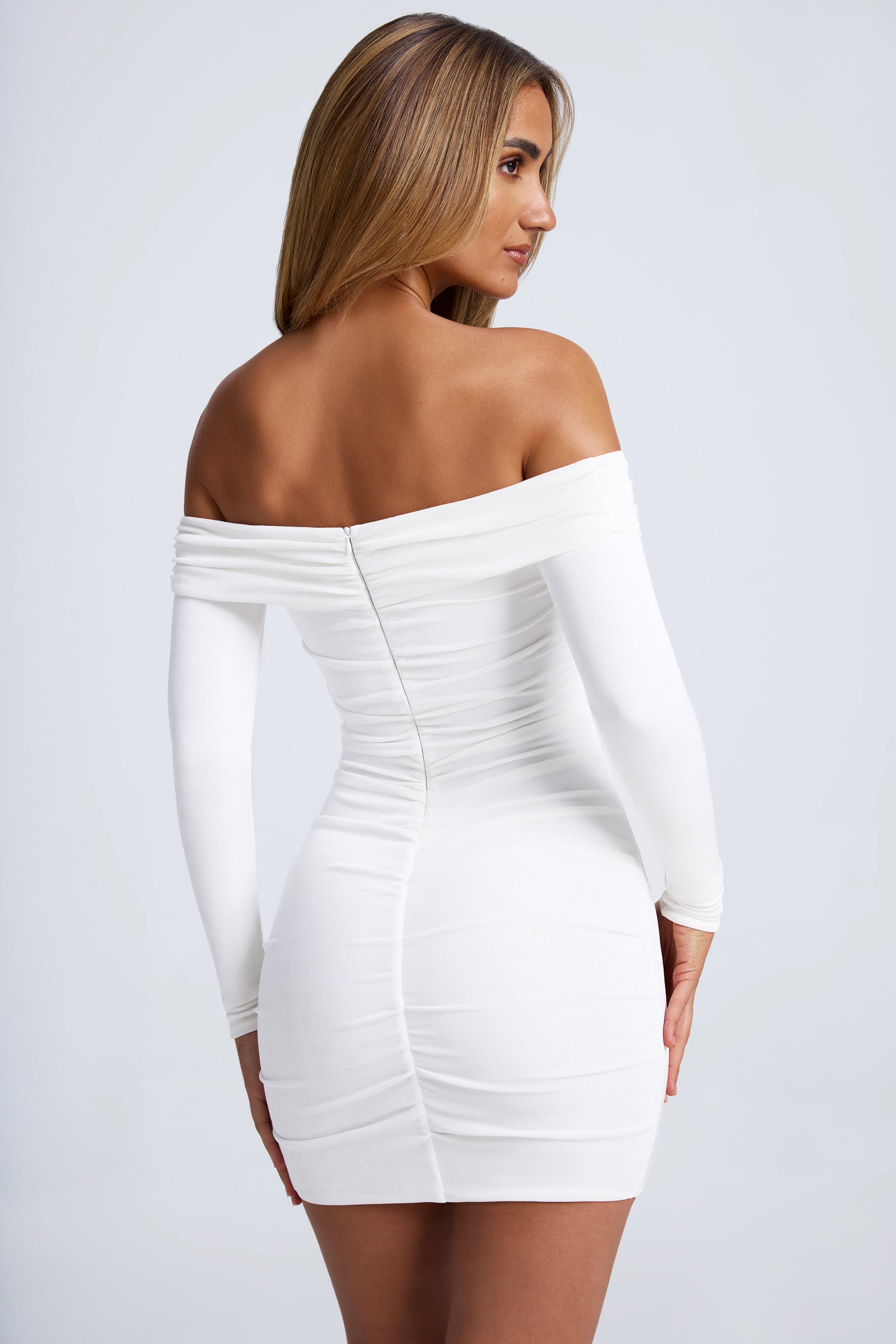 Saffron Hardware Detail Off-Shoulder Cut-Out Mini Dress in White - Image 2