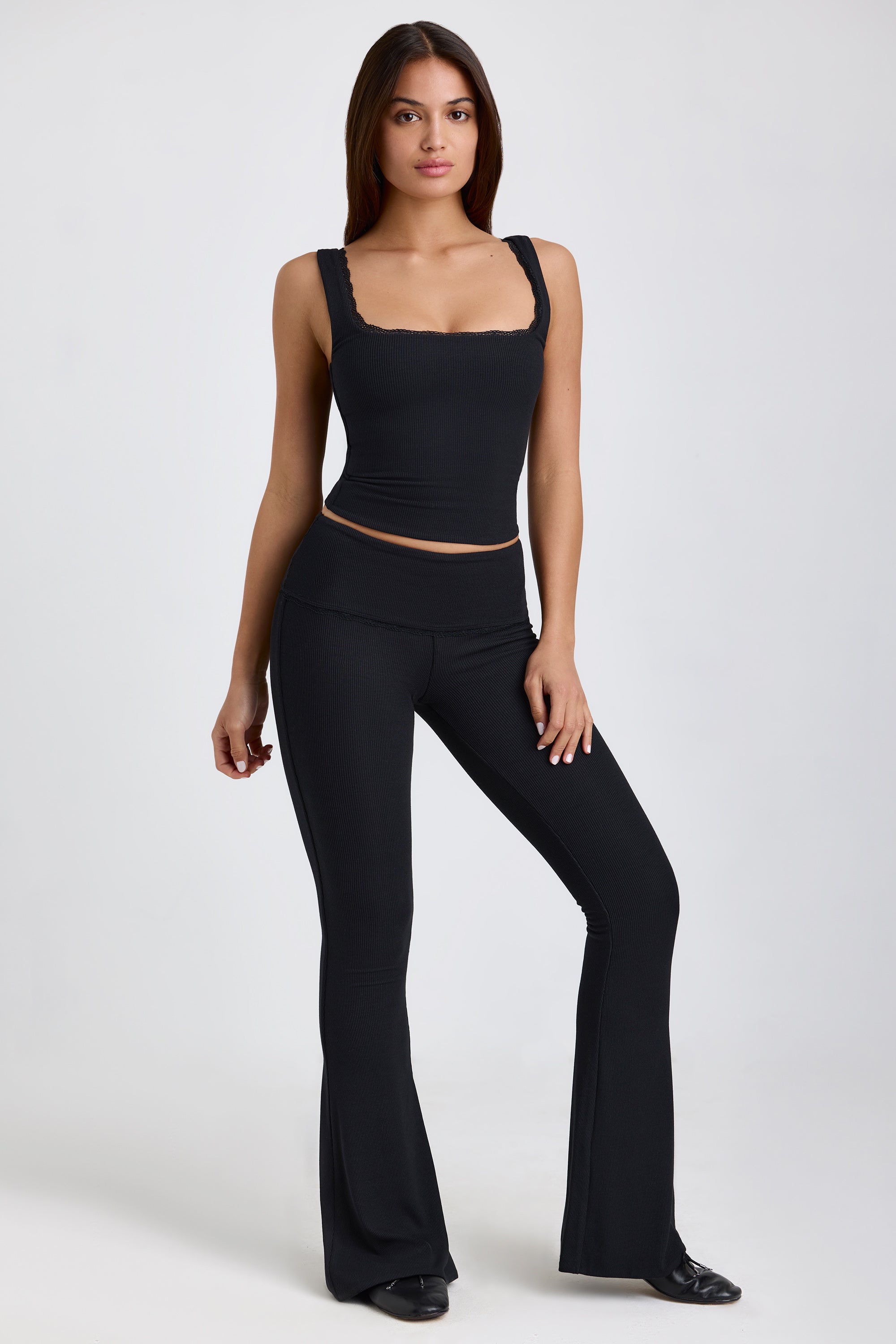 Jules Ribbed Modal Mid-Rise Foldover Flared Trousers in Black