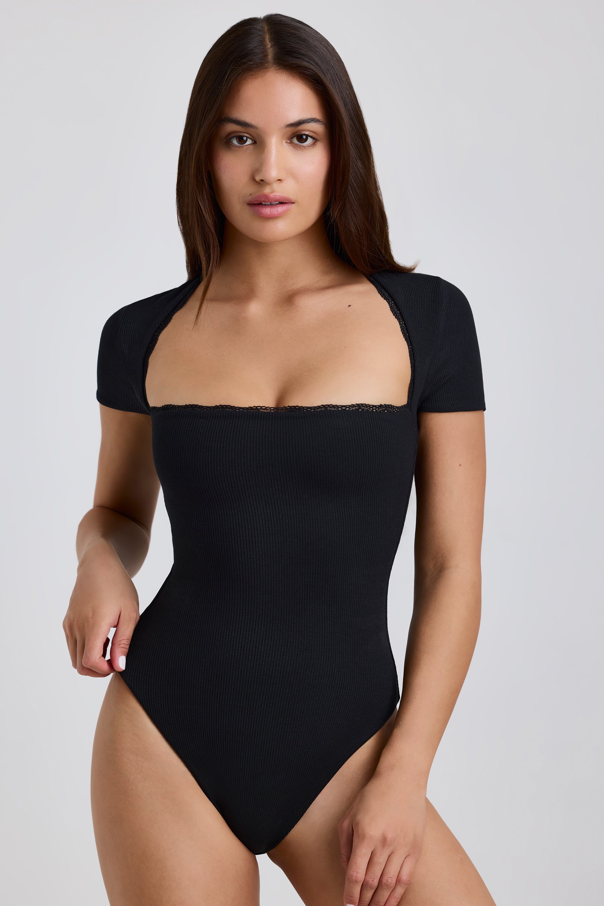 Arden Ribbed Modal Lace-Trim Bodysuit in Black