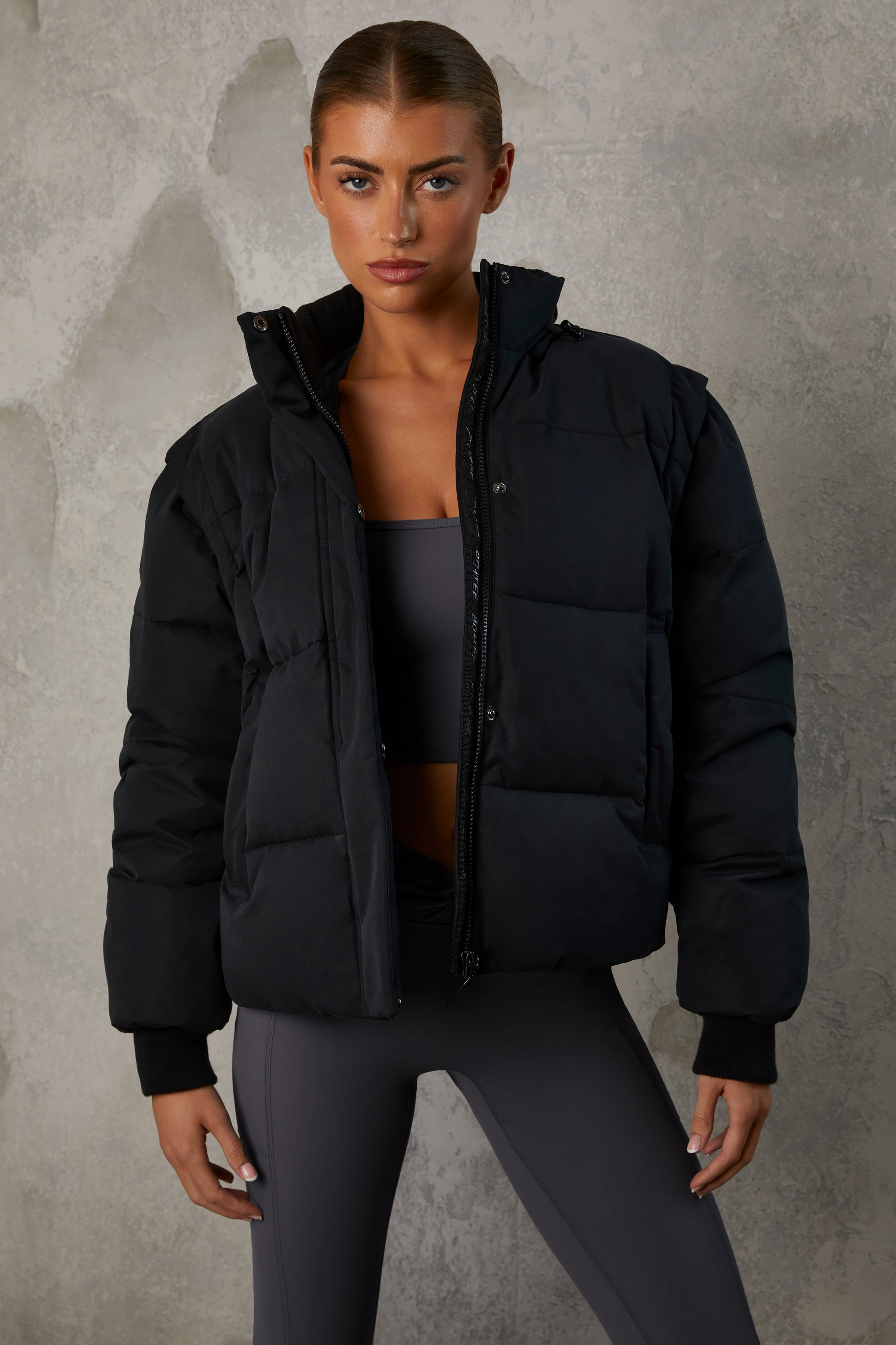 Essential Cropped Puffer Jacket with Detachable Sleeves in Black - Image 8