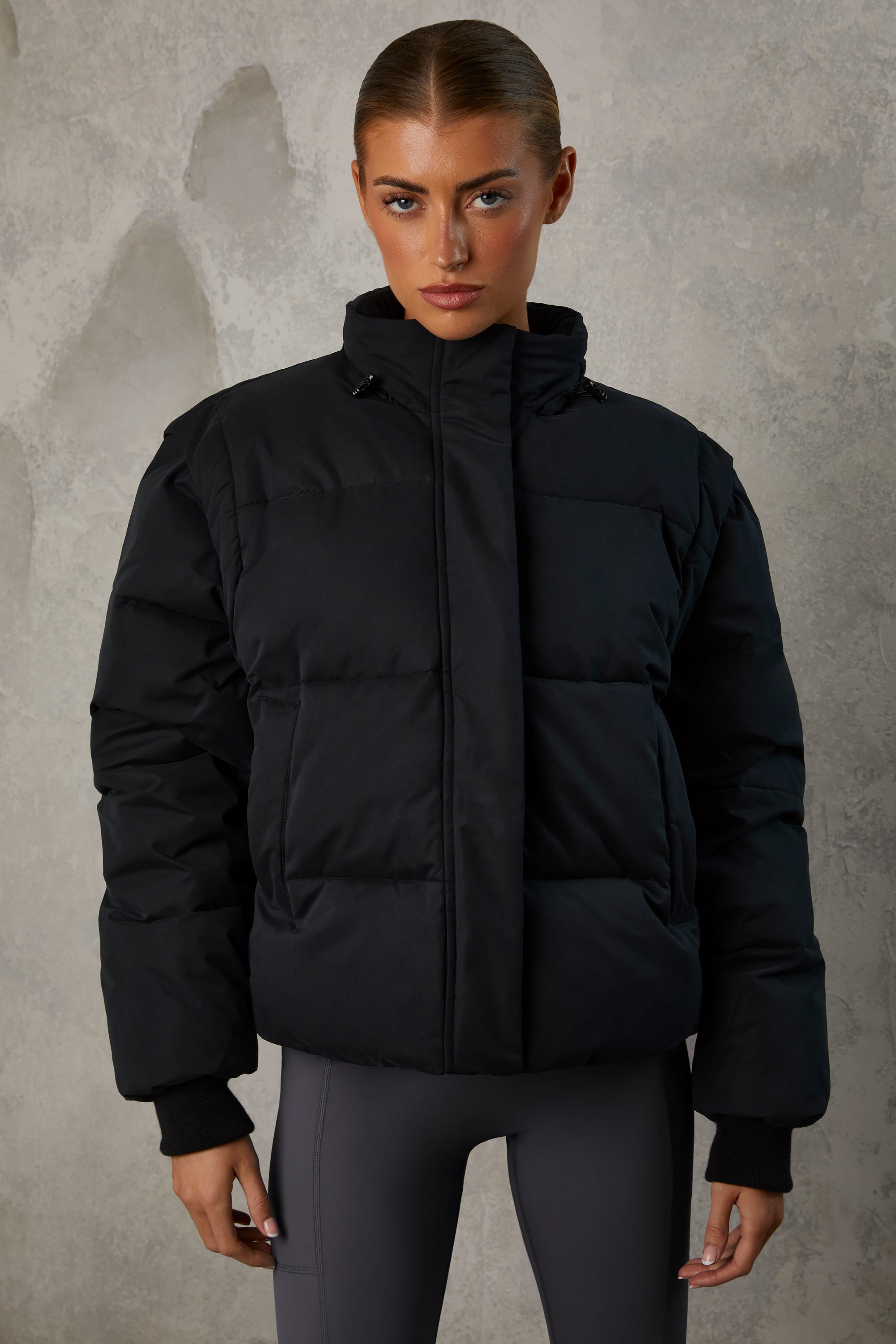 Essential Cropped Puffer Jacket with Detachable Sleeves in Black - Image 9