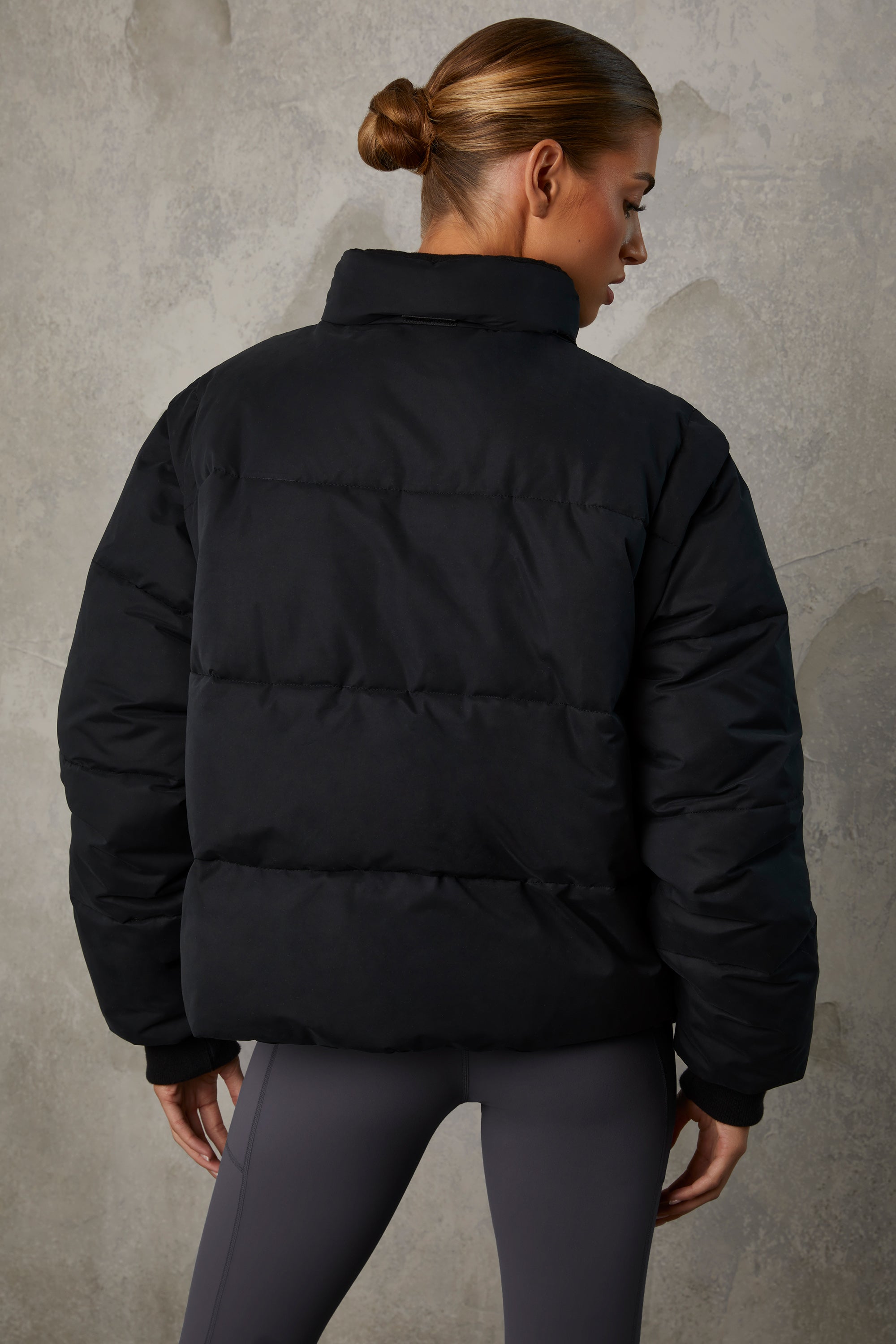 Essential Cropped Puffer Jacket with Detachable Sleeves in Black - Image 2