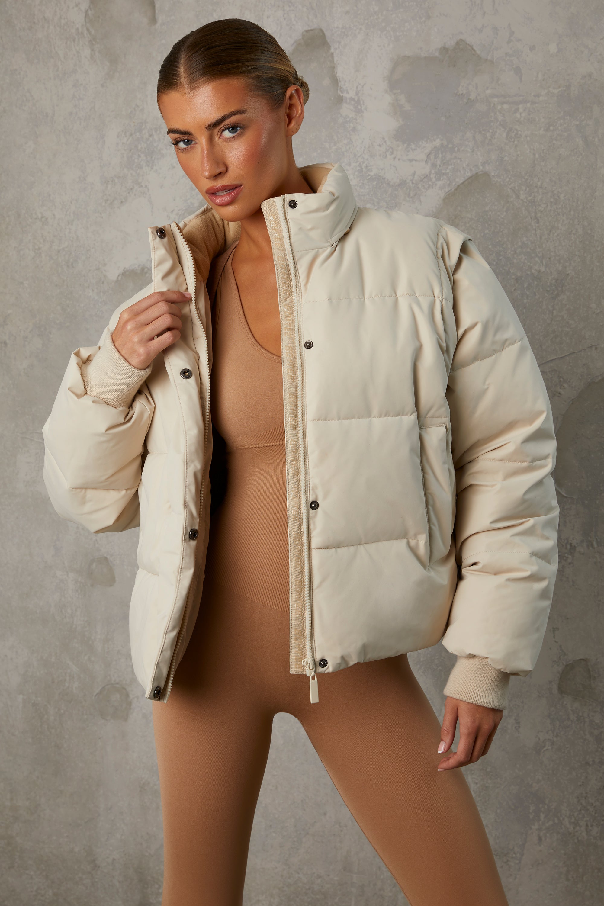 Essential Cropped Puffer Jacket with Detachable Sleeves in Sand - Image 9
