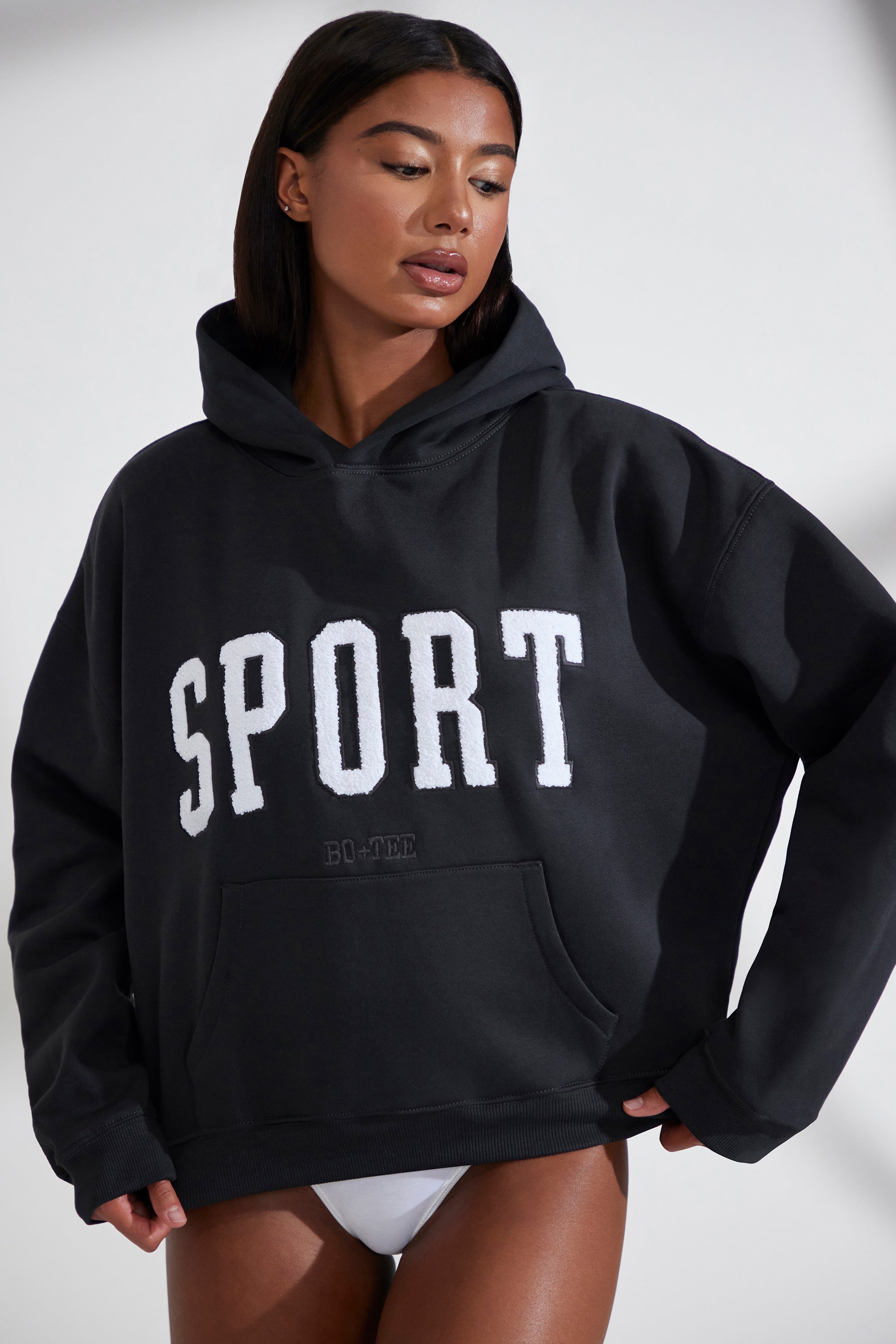 Varsity Oversized Hooded Sweatshirt in Black