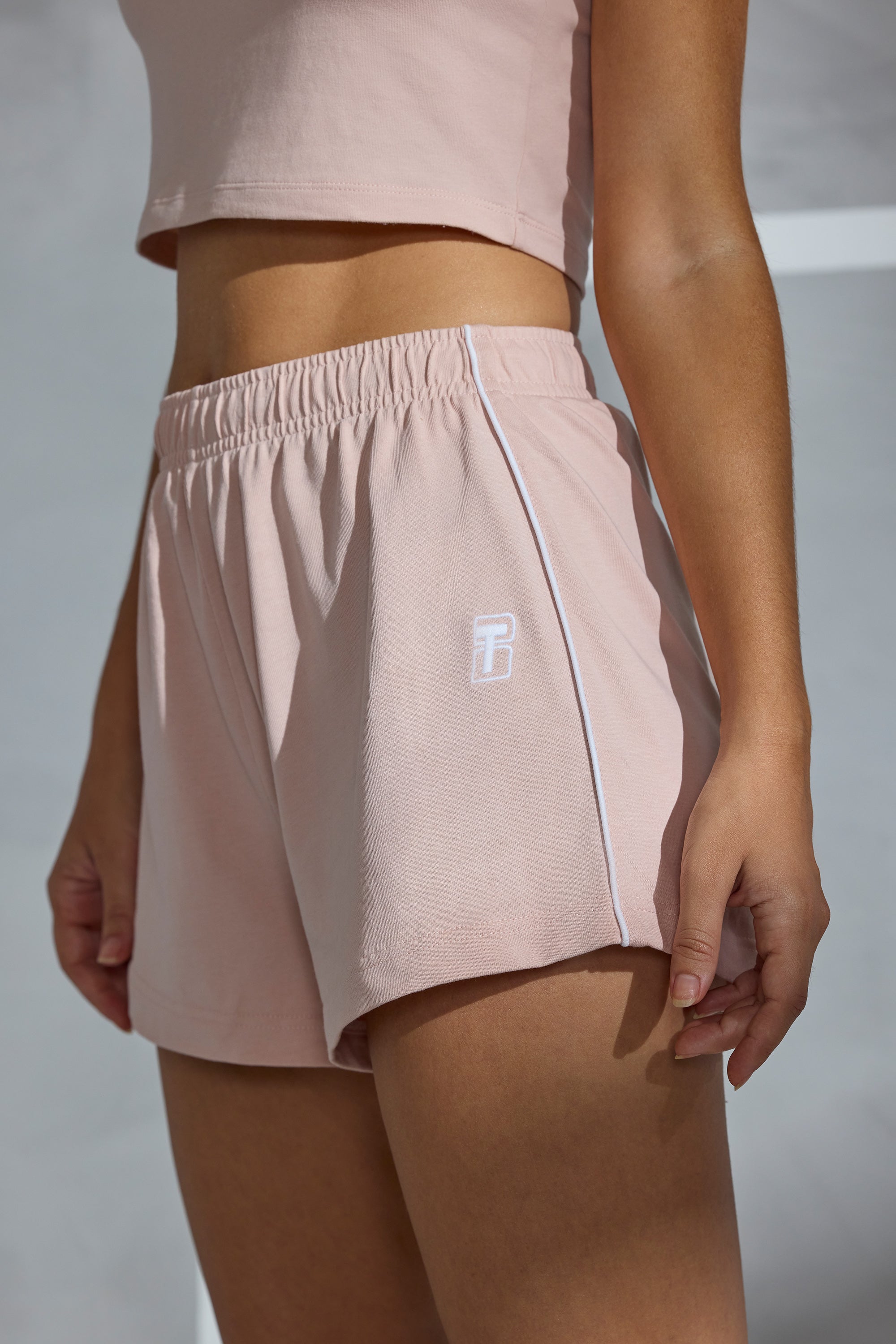 On Track Piped Detail Mini Sweat Shorts in Soft Peach - Image 4