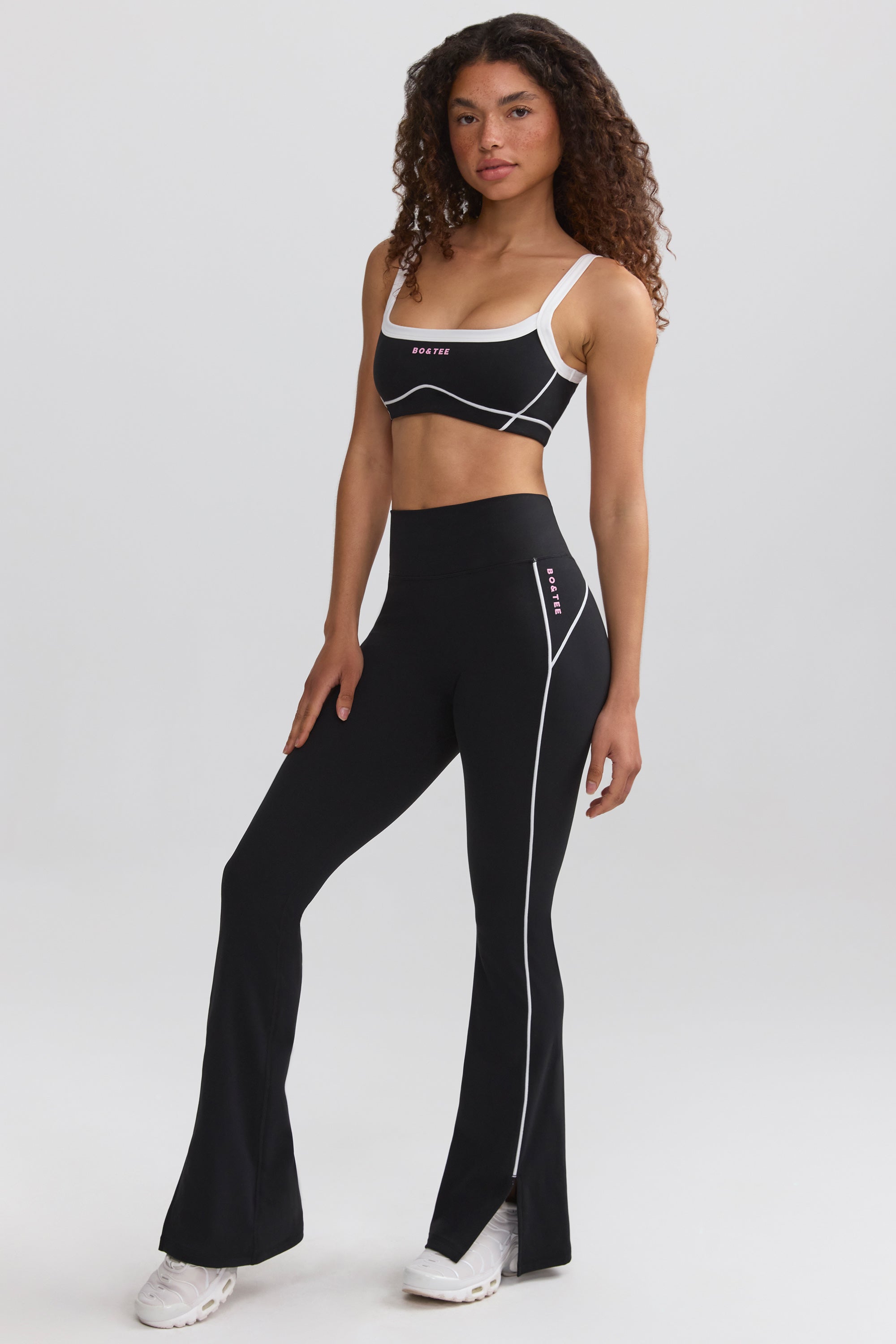 Soft Active Contrast-Trim Flared Trousers in Black - Image 7