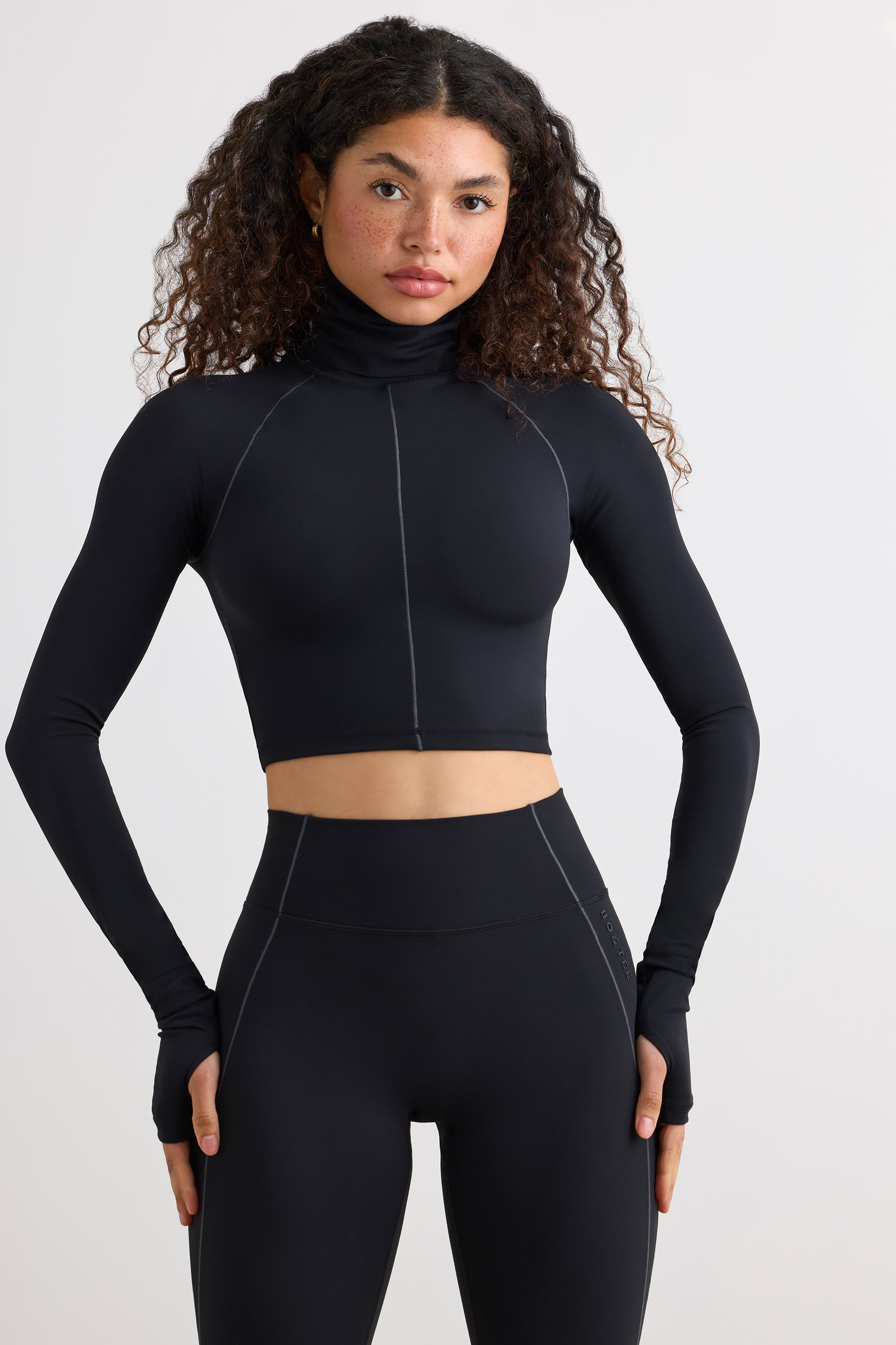 Soft Active Turtleneck Crop Top in Black - Image 7