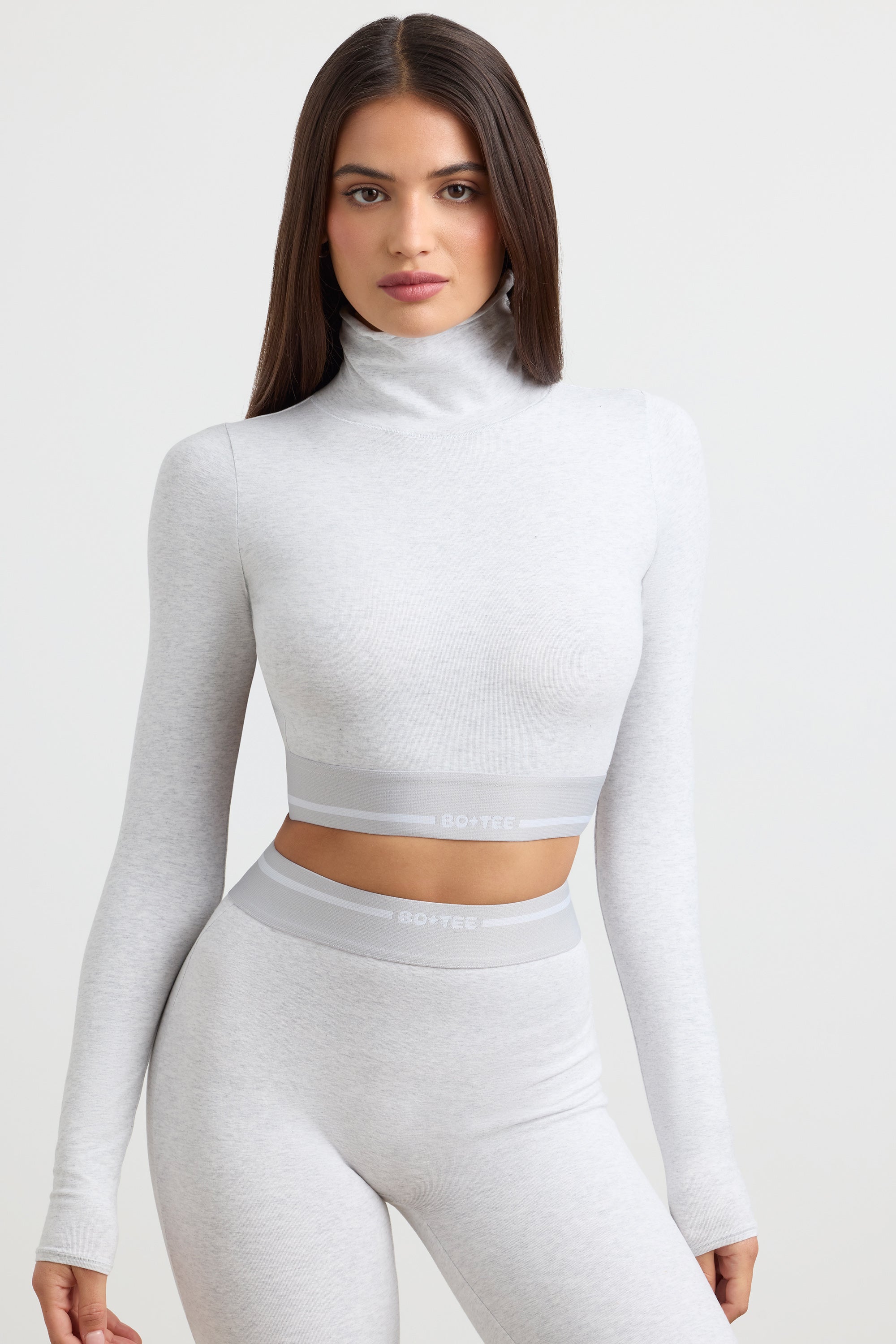Grounded Turtleneck Backless Long-Sleeve Crop Top in Grey Marl