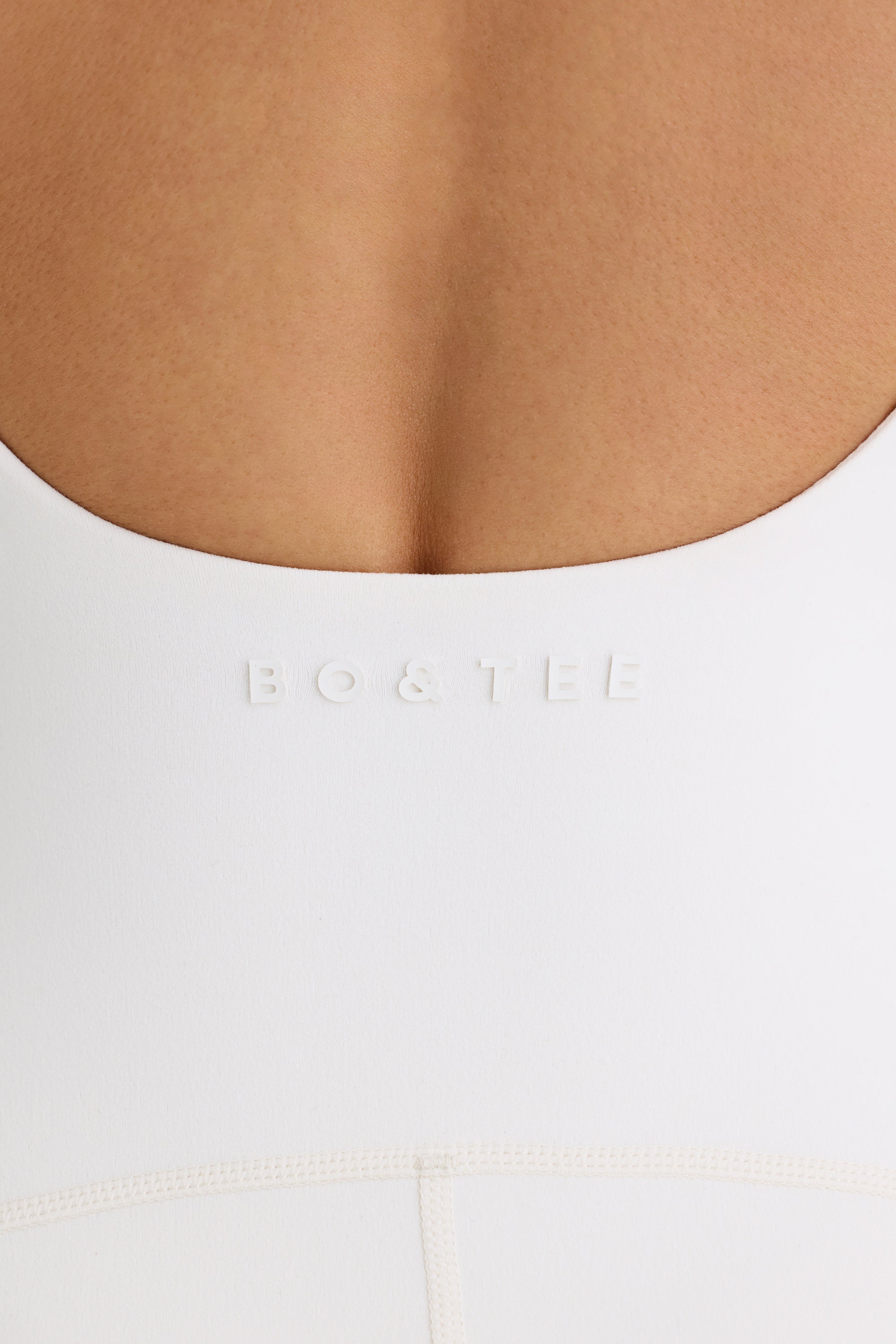 Jet Set Soft Active Open-Back Unitard in White - Image 5