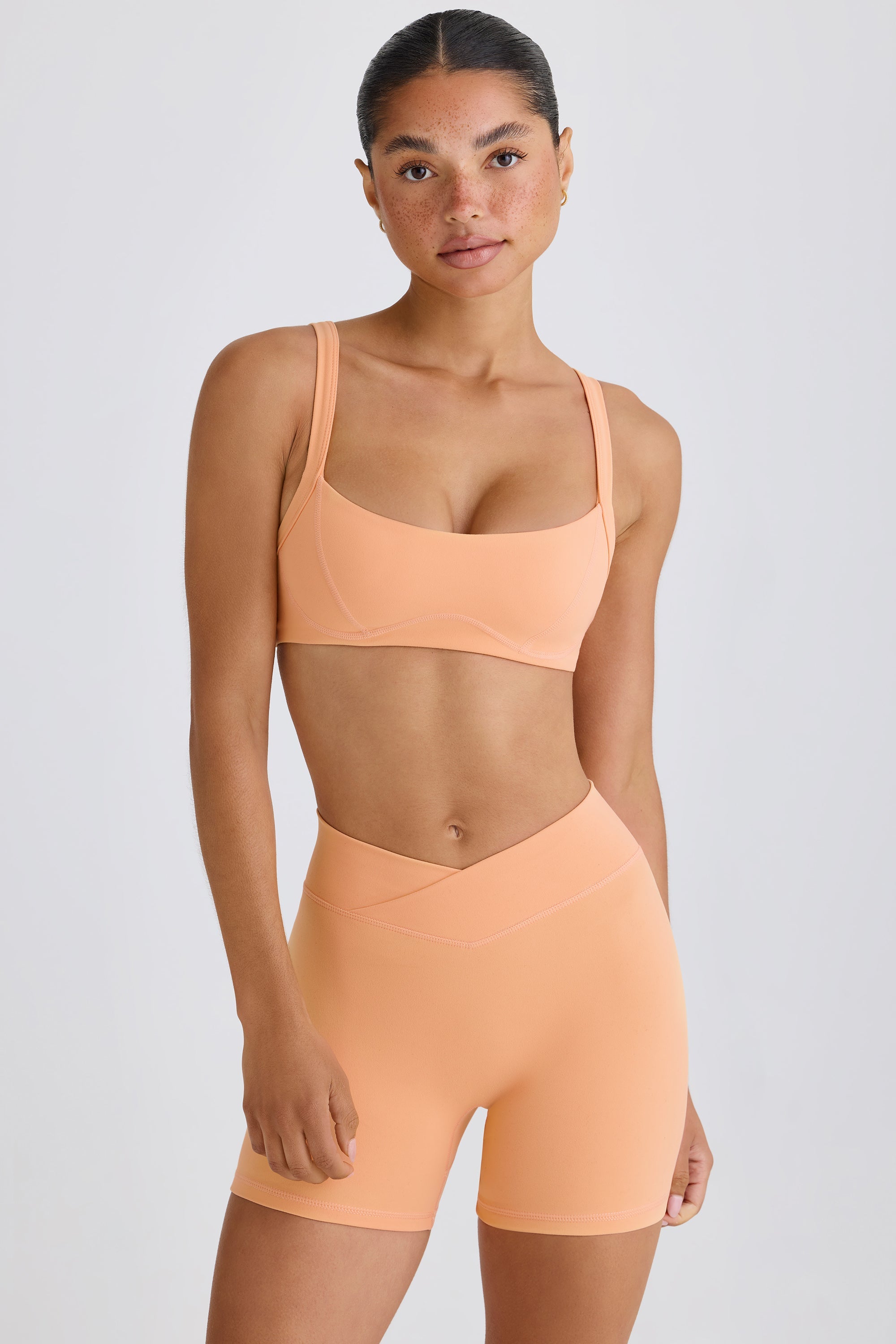 Jet Set Soft Active Contrast-Trim Sports Bra in Peach - Image 6