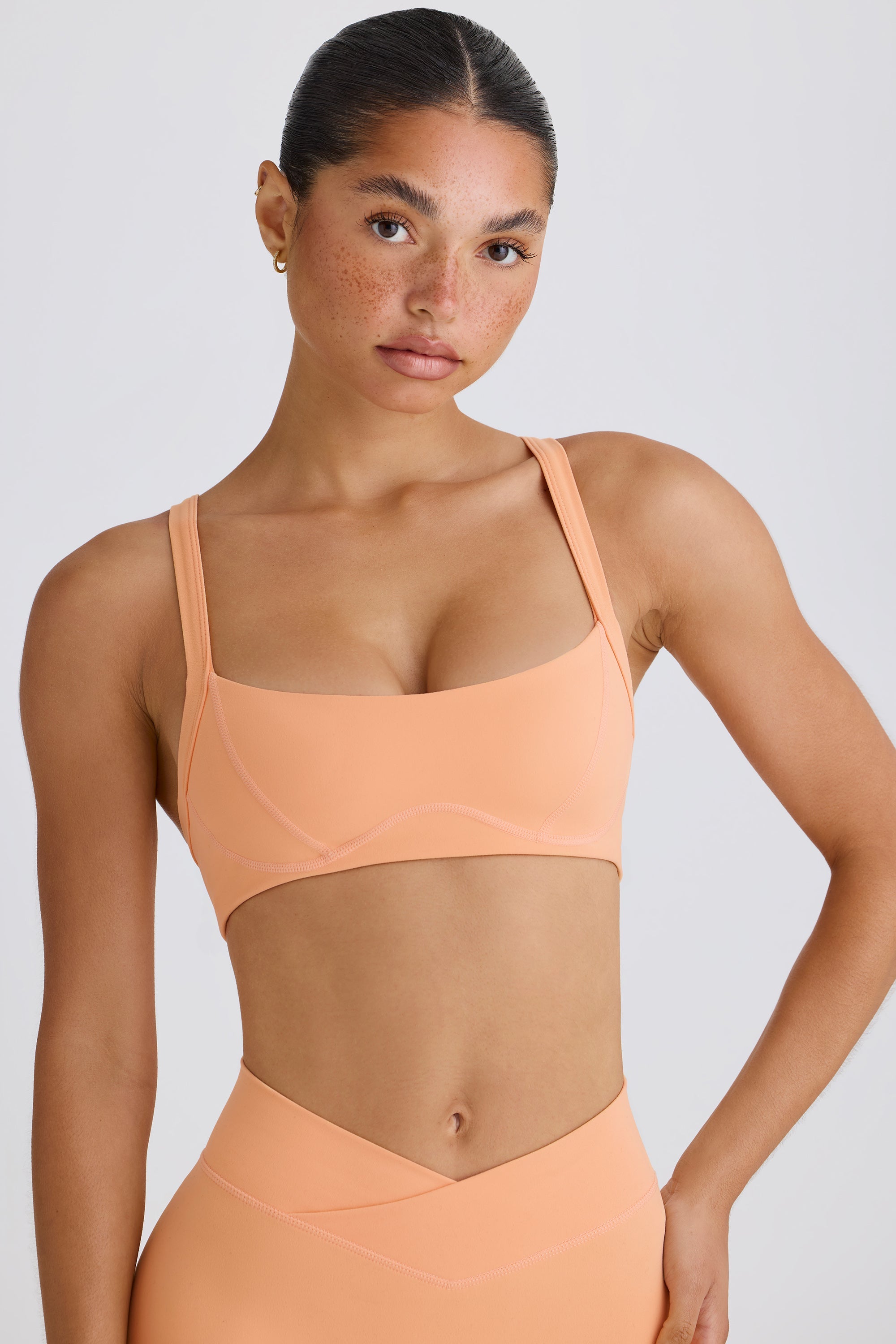 Jet Set Soft Active Contrast-Trim Sports Bra in Peach - Image 7