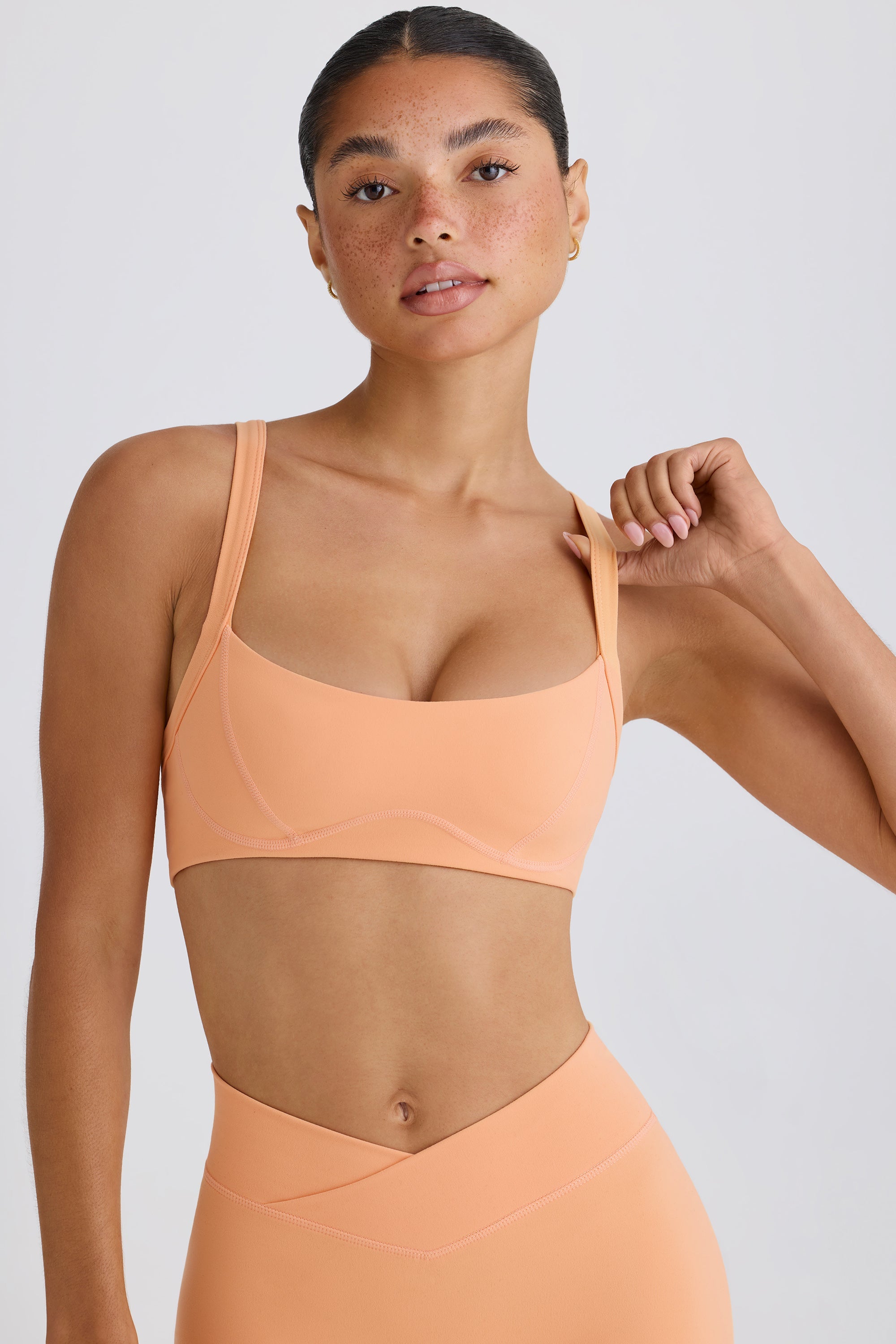 Jet Set Soft Active Contrast-Trim Sports Bra in Peach