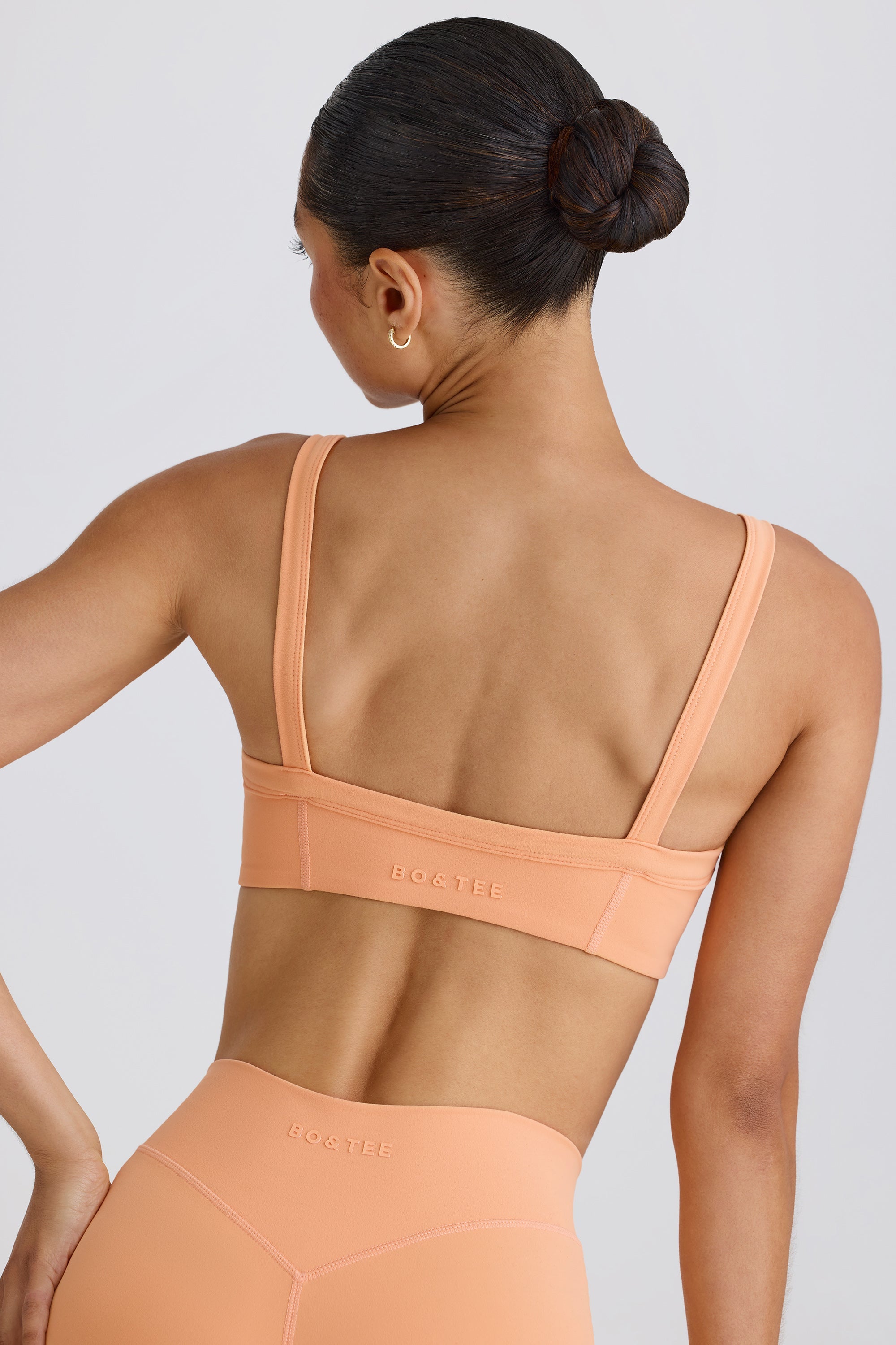 Jet Set Soft Active Contrast-Trim Sports Bra in Peach - Image 2