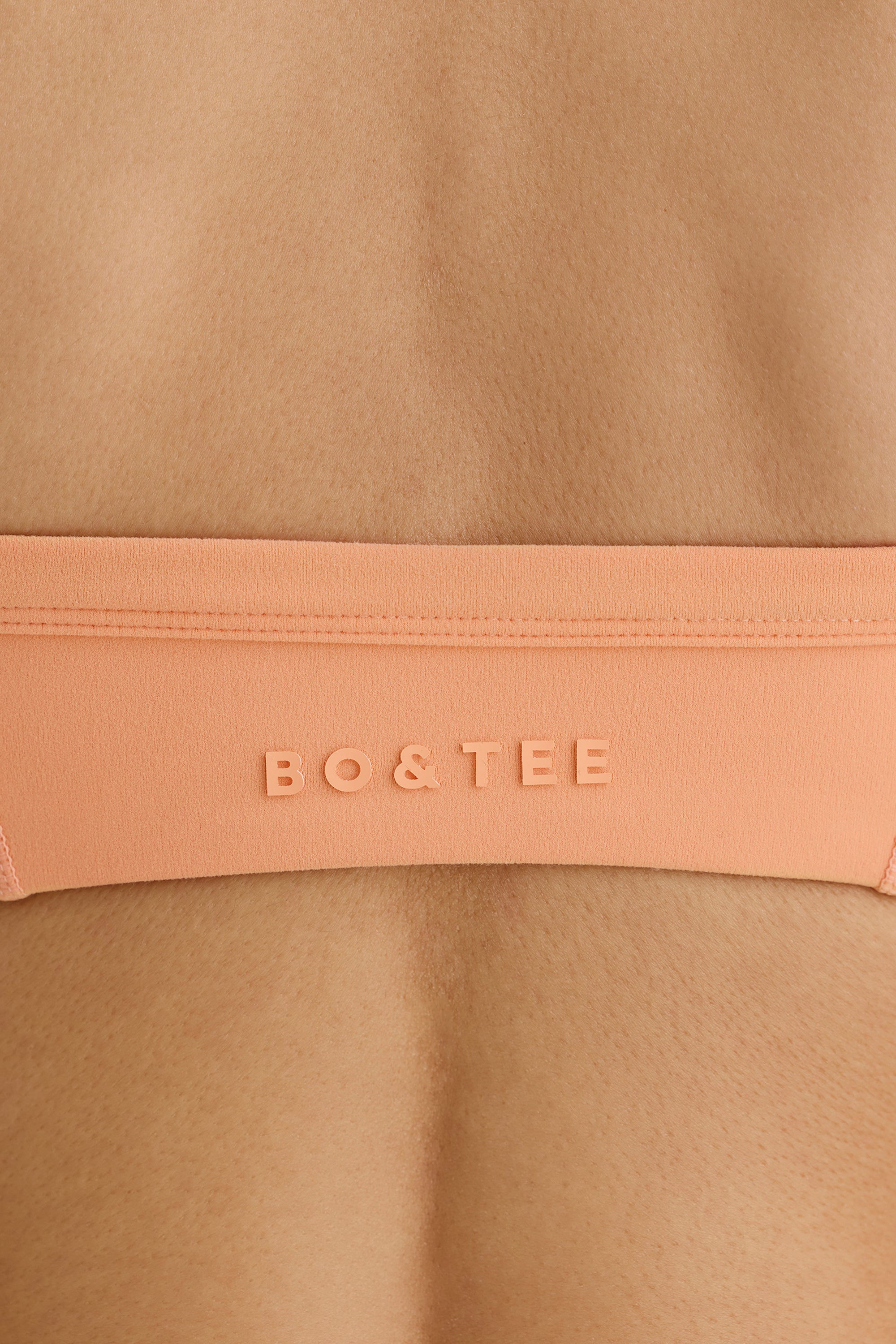 Jet Set Soft Active Contrast-Trim Sports Bra in Peach - Image 4