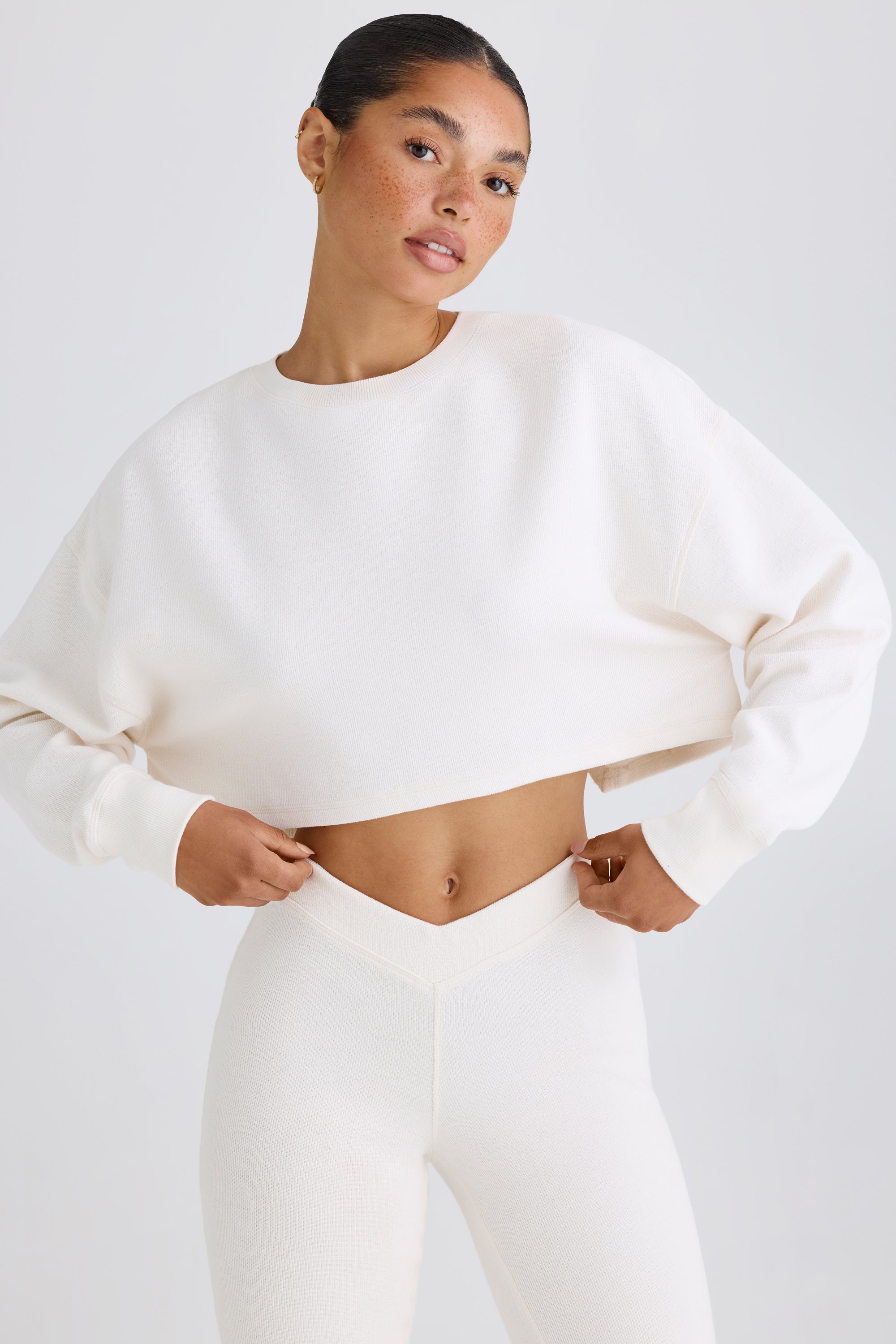 Jet Set Crew-Neck Open-Back Cropped Sweatshirt in White - Image 2