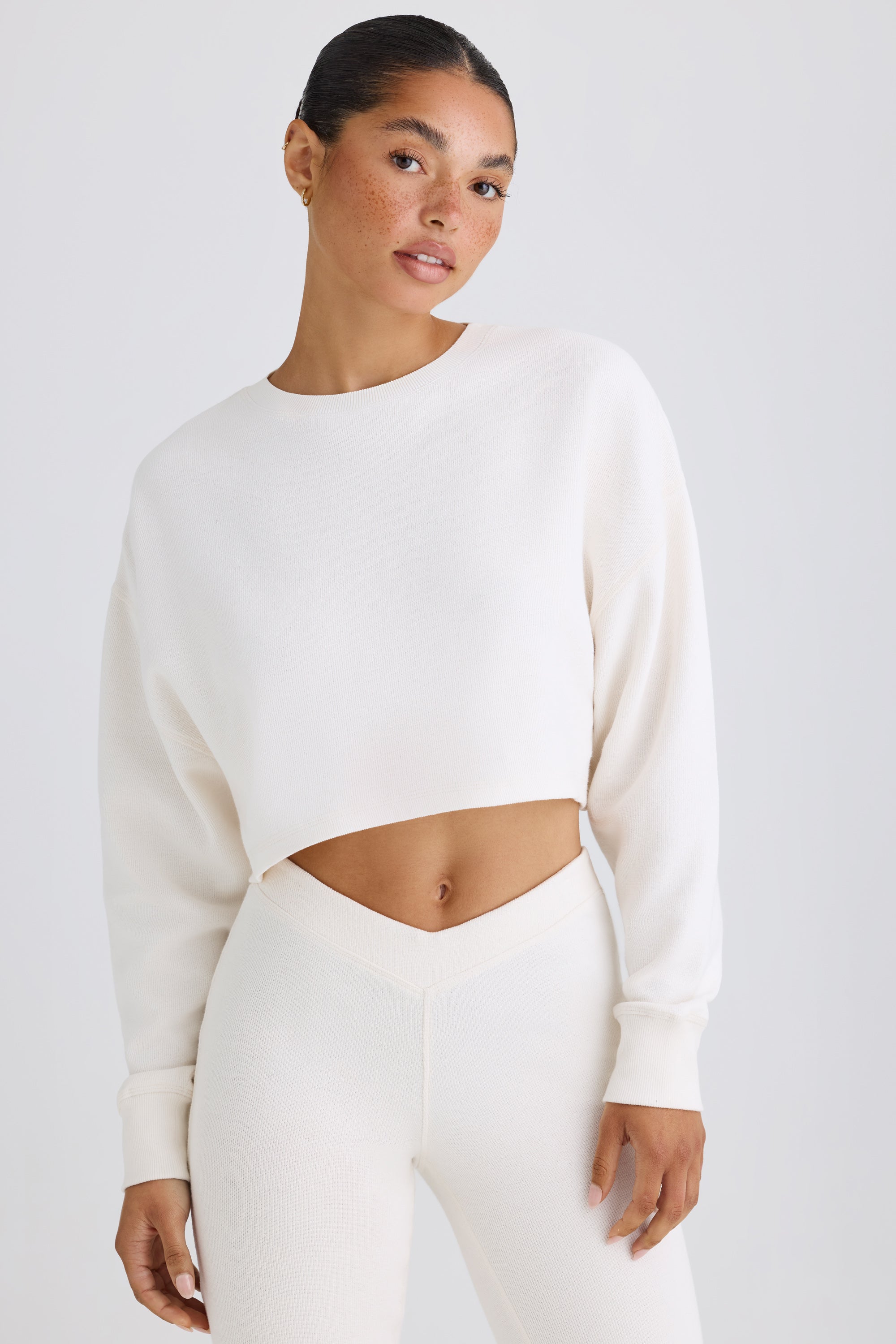 Jet Set Crew-Neck Open-Back Cropped Sweatshirt in White - Image 6