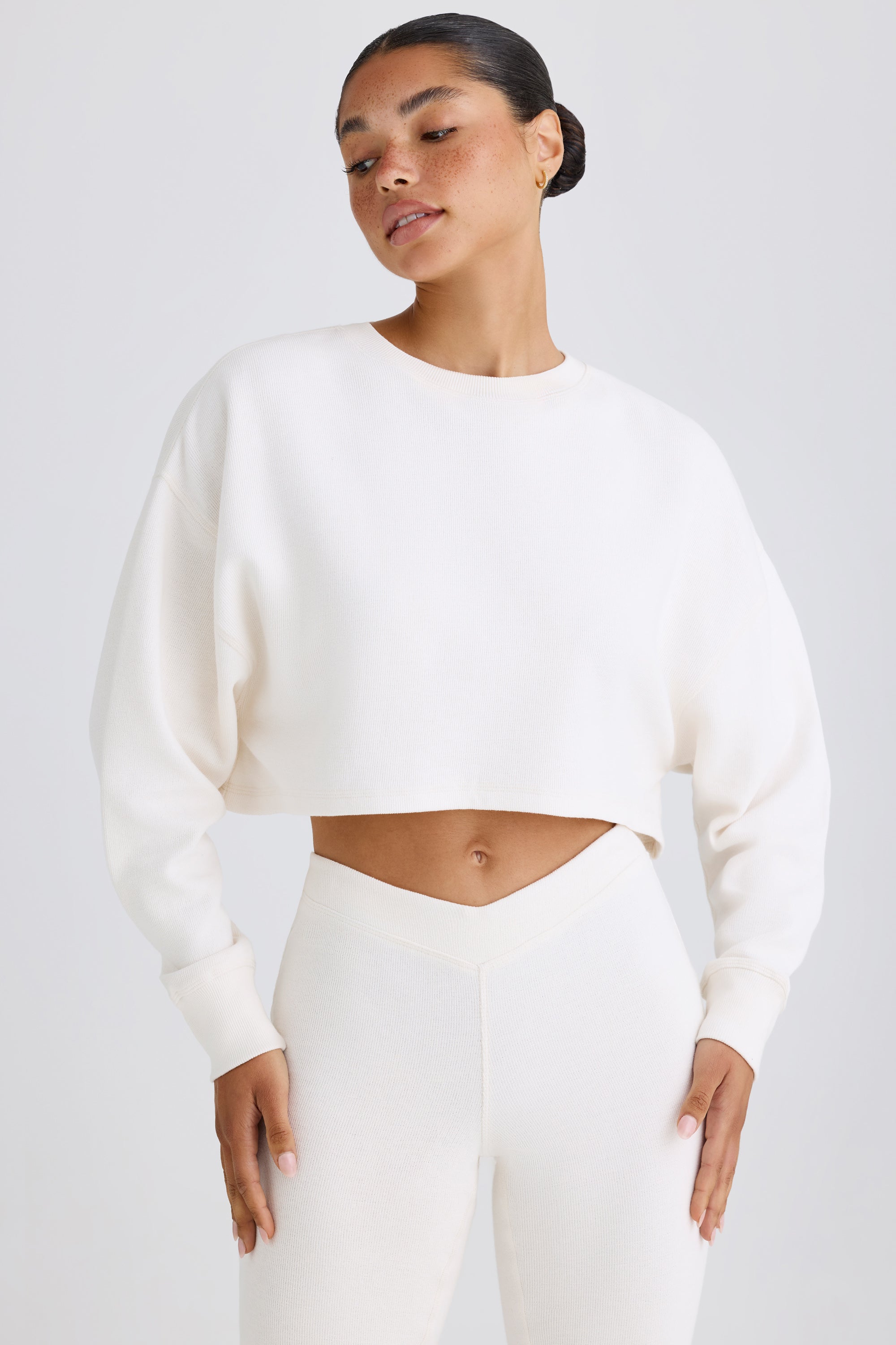 Jet Set Crew-Neck Open-Back Cropped Sweatshirt in White - Image 7