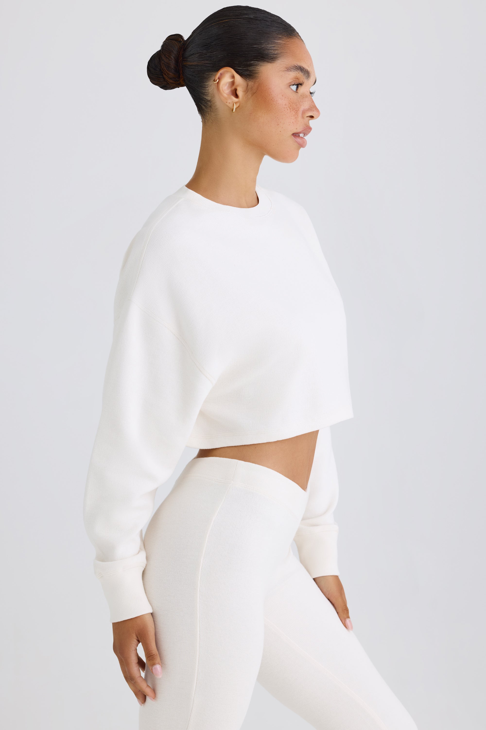 Jet Set Crew-Neck Open-Back Cropped Sweatshirt in White - Image 3