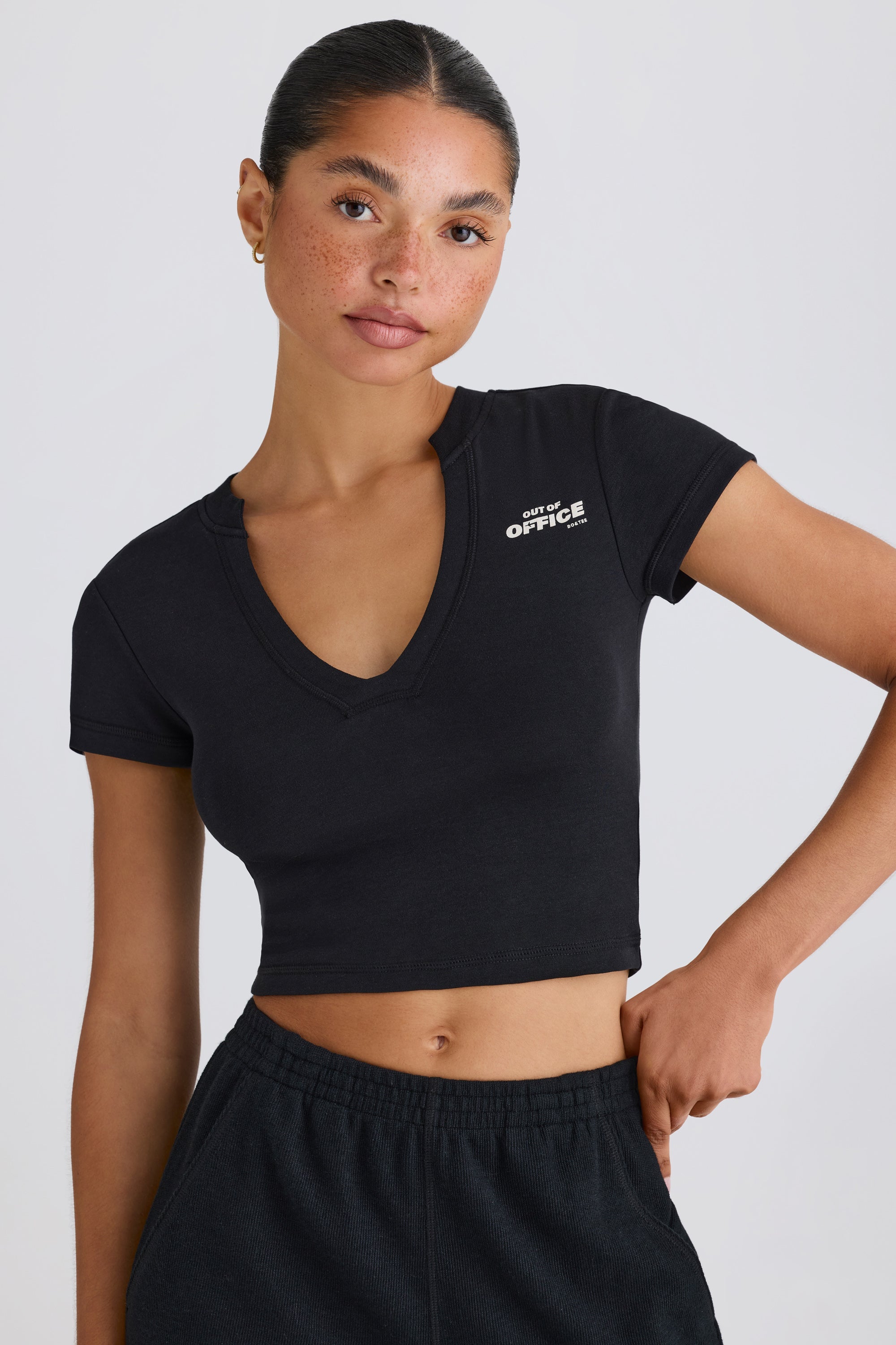 Jet Set Graphic-Print Cropped T-Shirt in Black