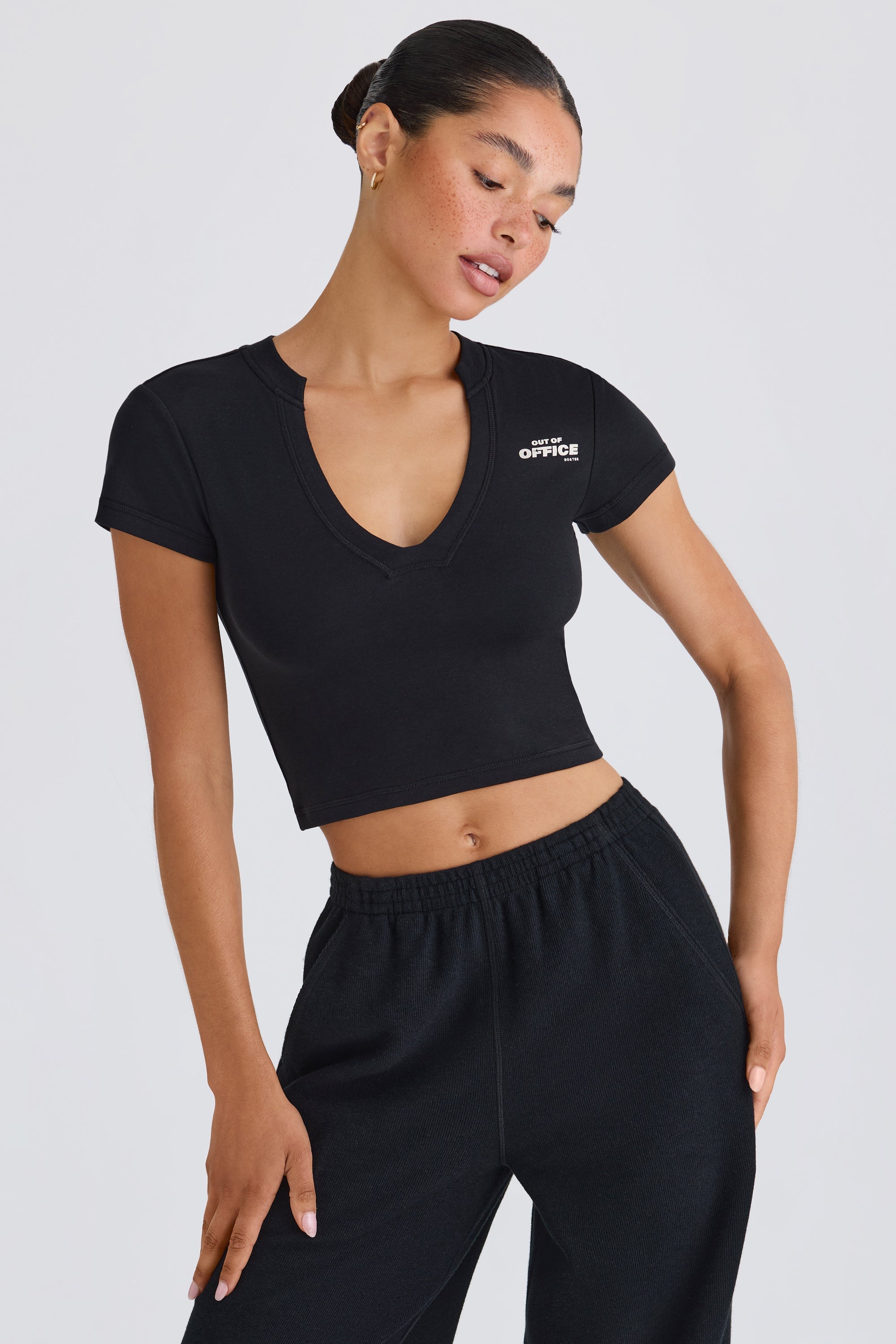 Jet Set Graphic-Print Cropped T-Shirt in Black - Image 7