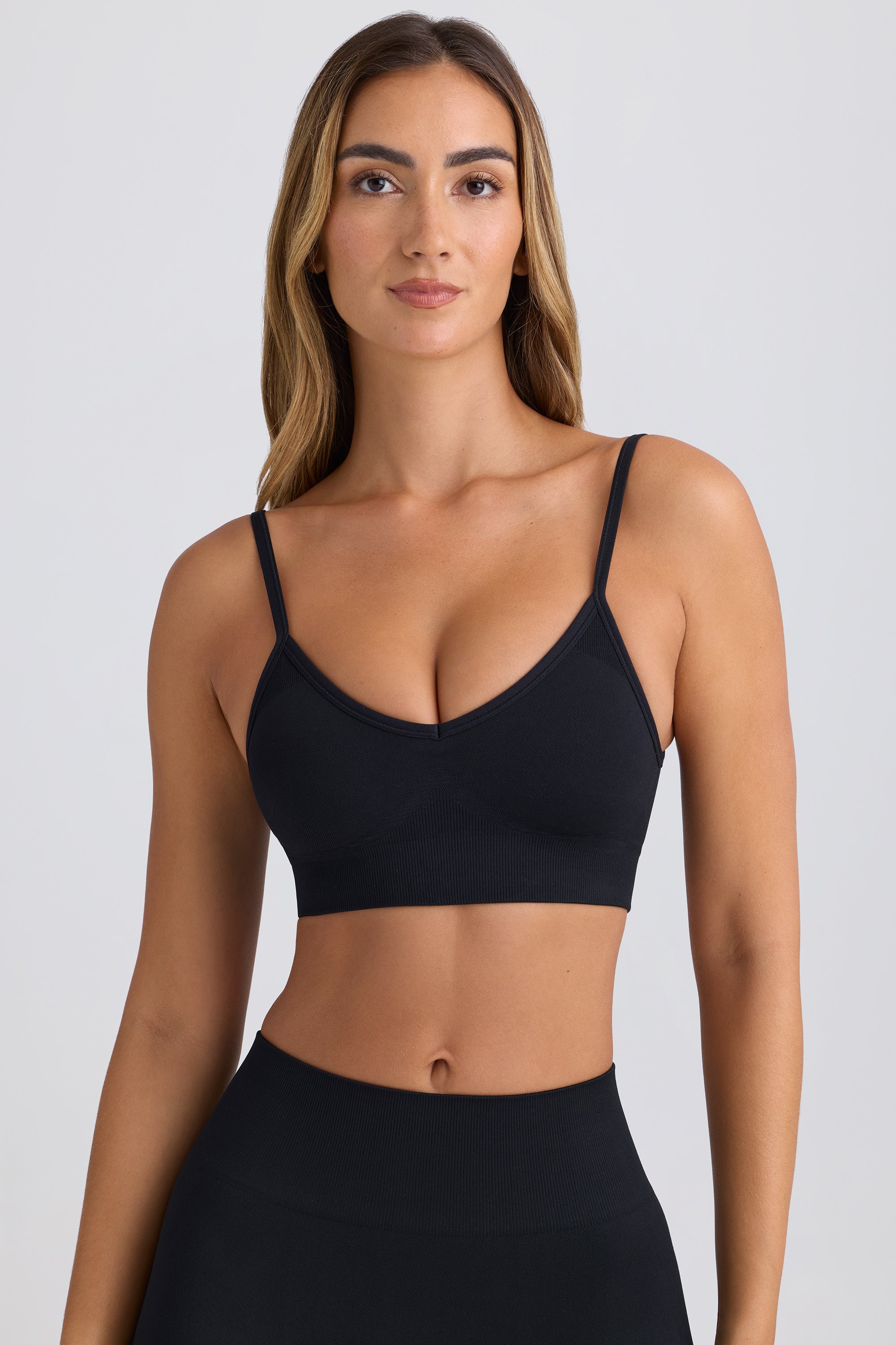 Super Sculpt Seamless Scoop-Back Sports Bra in Black - Image 6