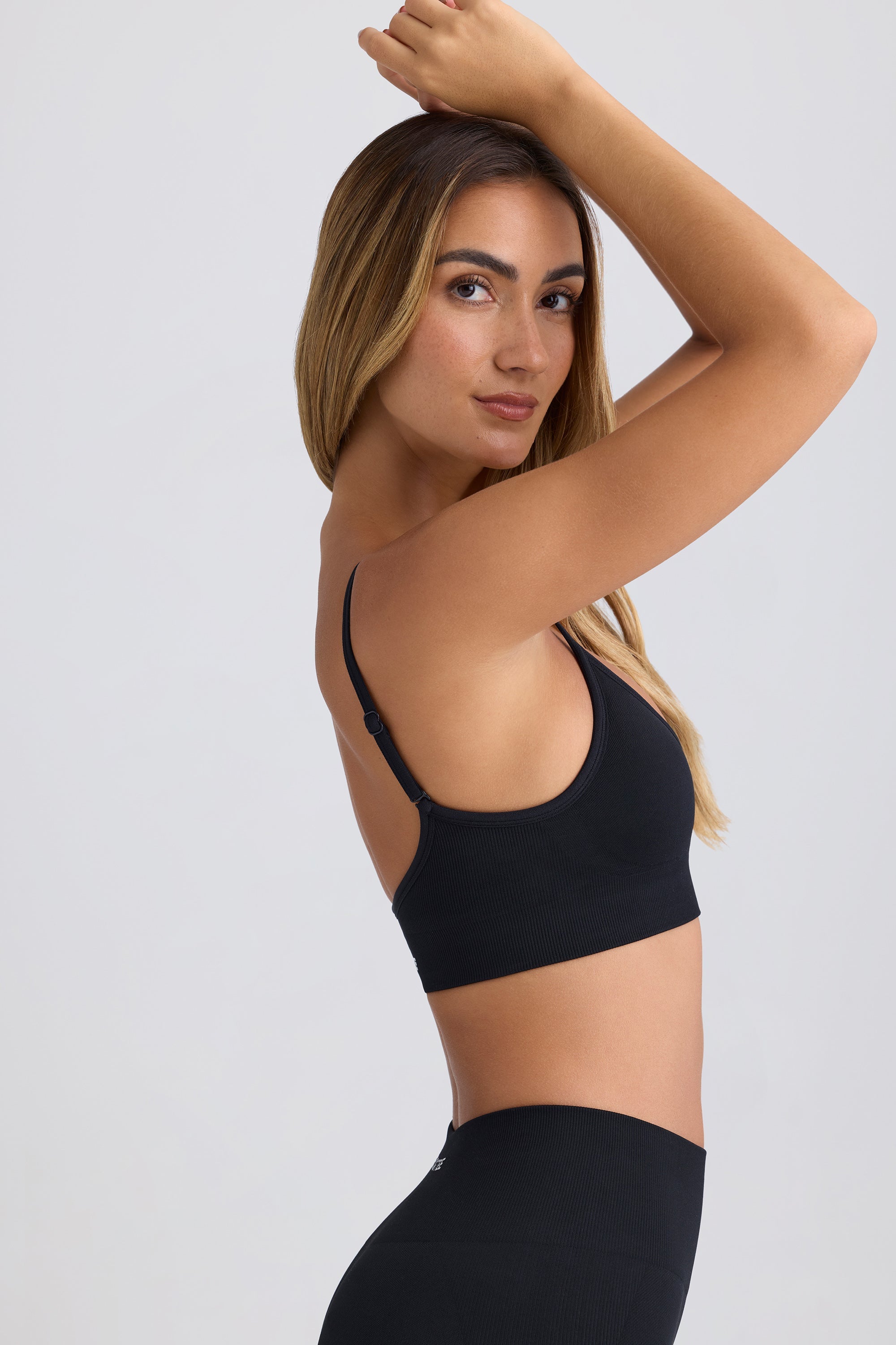 Super Sculpt Seamless Scoop-Back Sports Bra in Black - Image 3