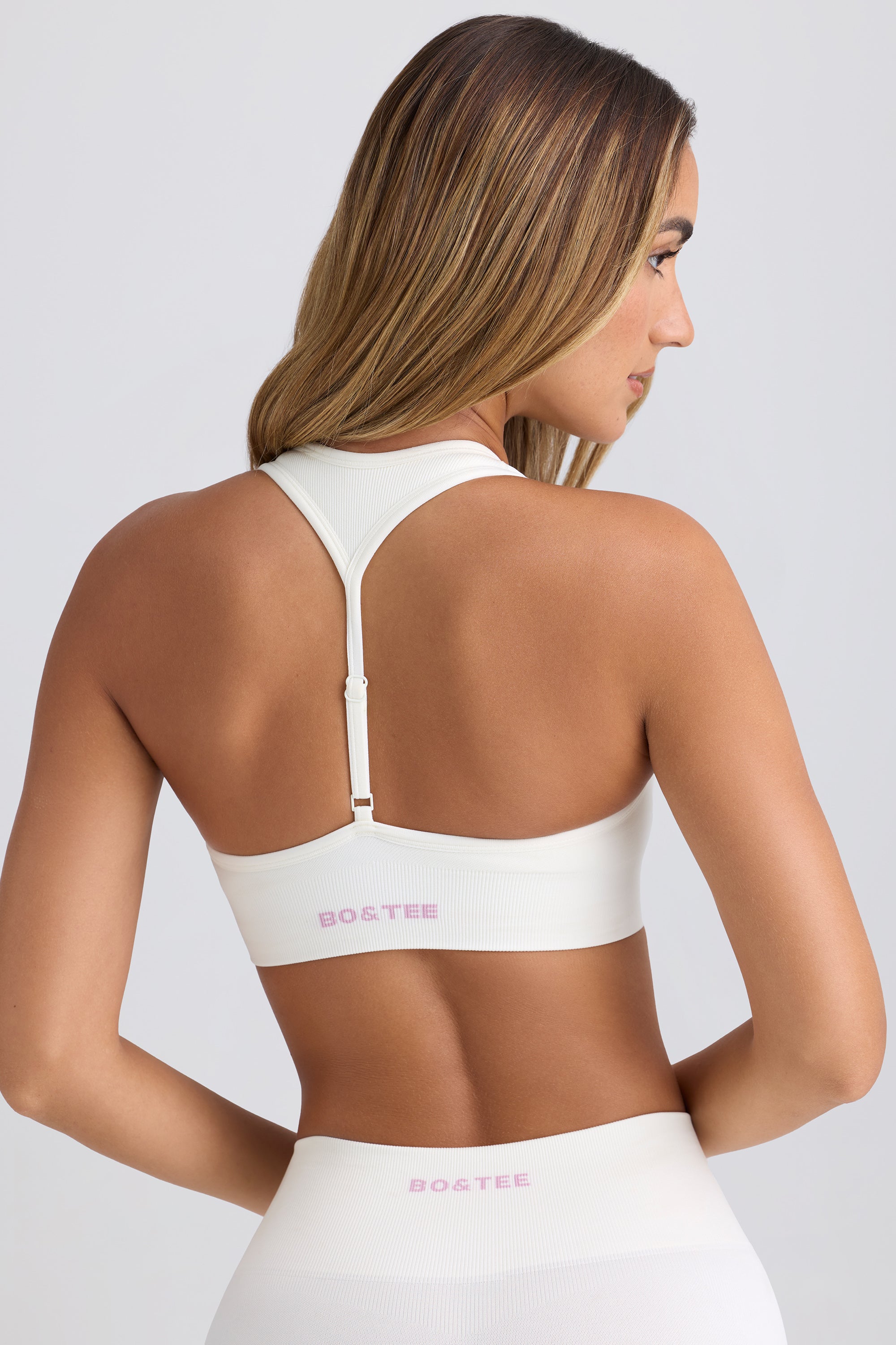 Super Sculpt Seamless T-Back Sports Bra in Eggshell - Image 5