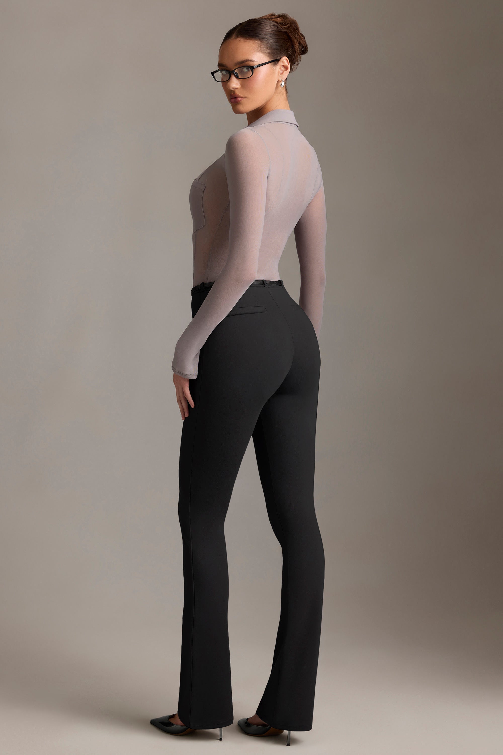 Althea Low-Rise Flared Trousers in Black - Image 2