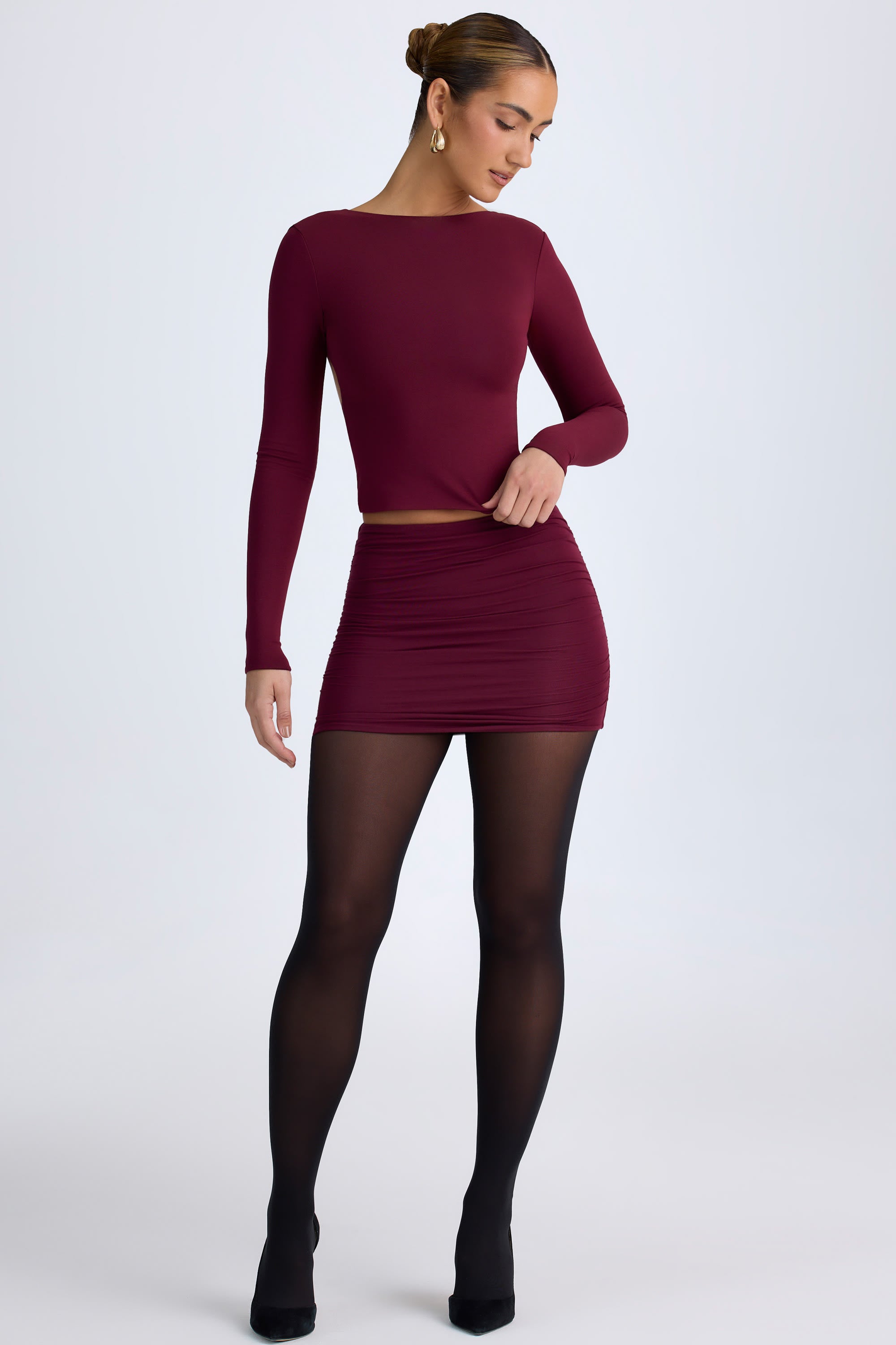 Cali Modal Ruched Mid-Rise Mini Skirt in Wine Red - Image 7