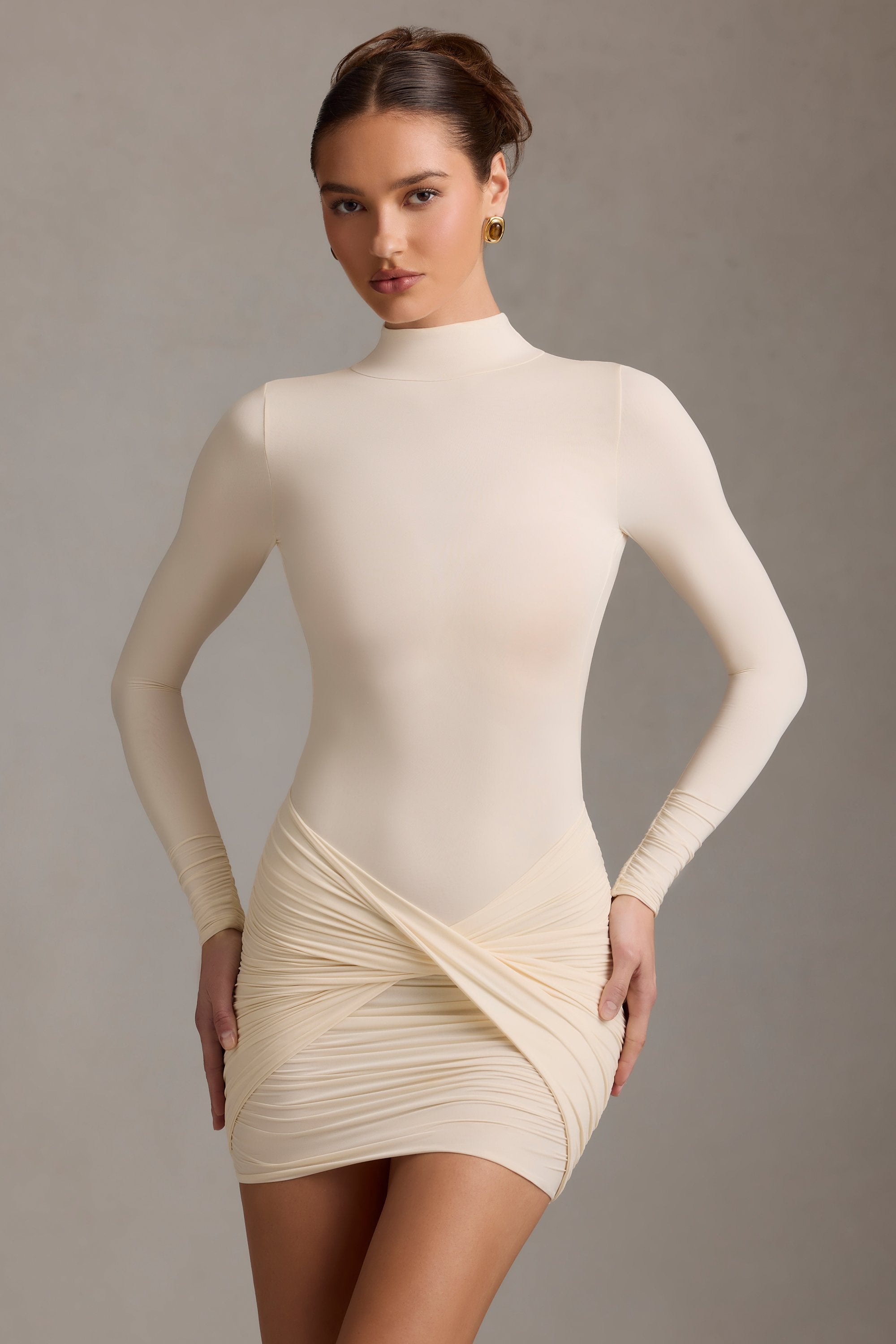 Isolde Ruched Backless Turtleneck Mini Dress in Ivory