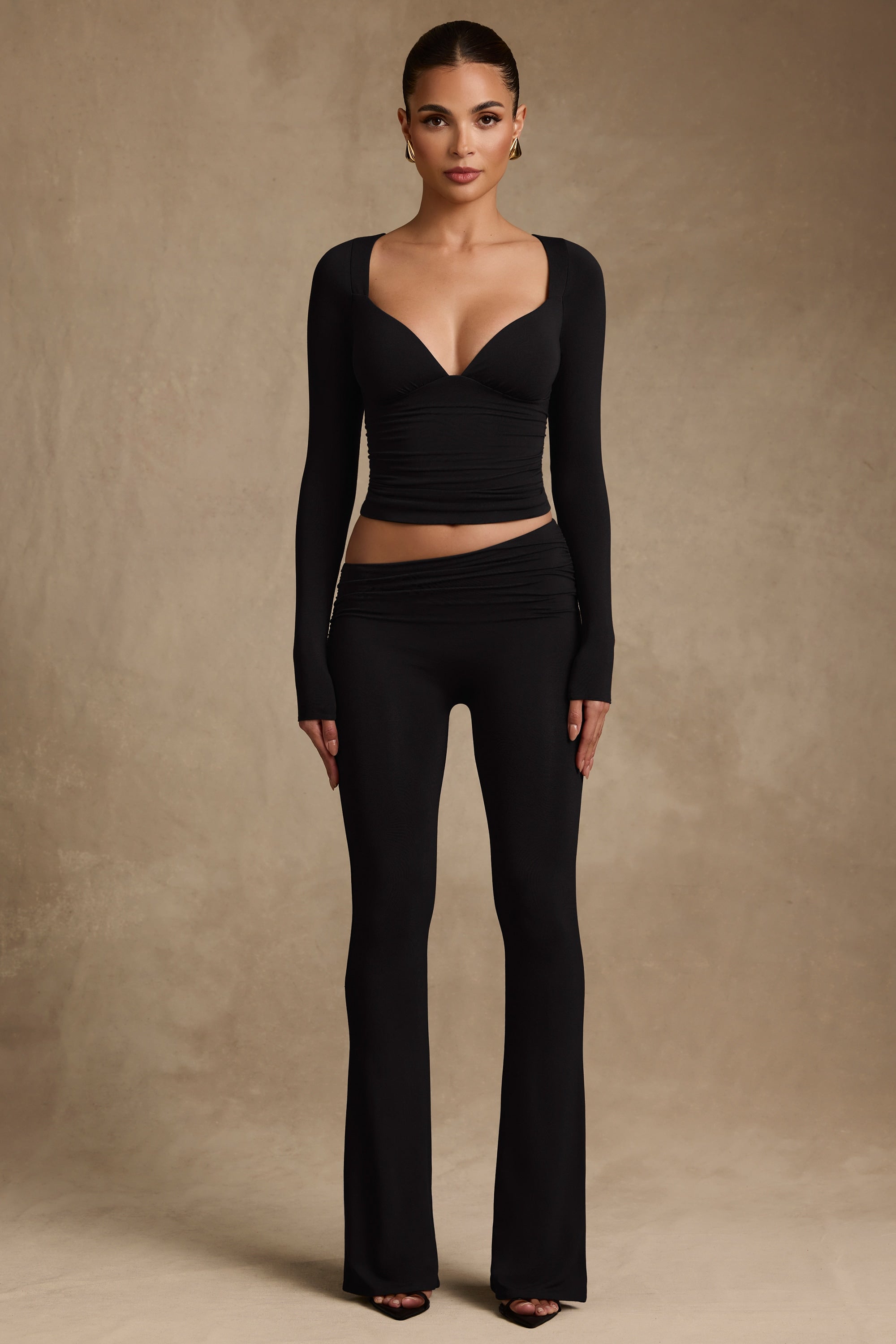 Kalei Modal Asymmetric-Waist Flared Trousers in Black