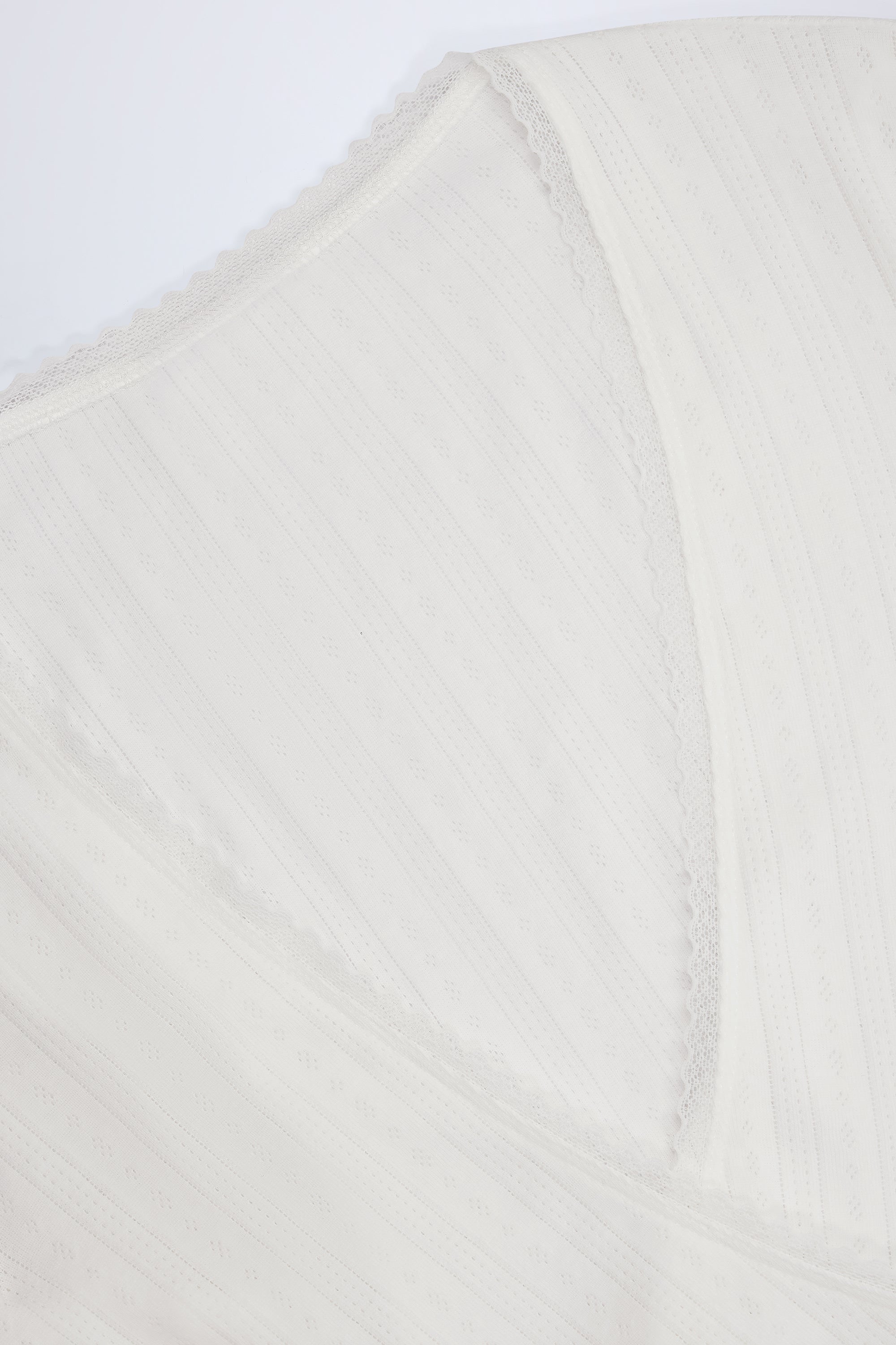 Lou Pointelle Wrap Crop Top in White - Image 6