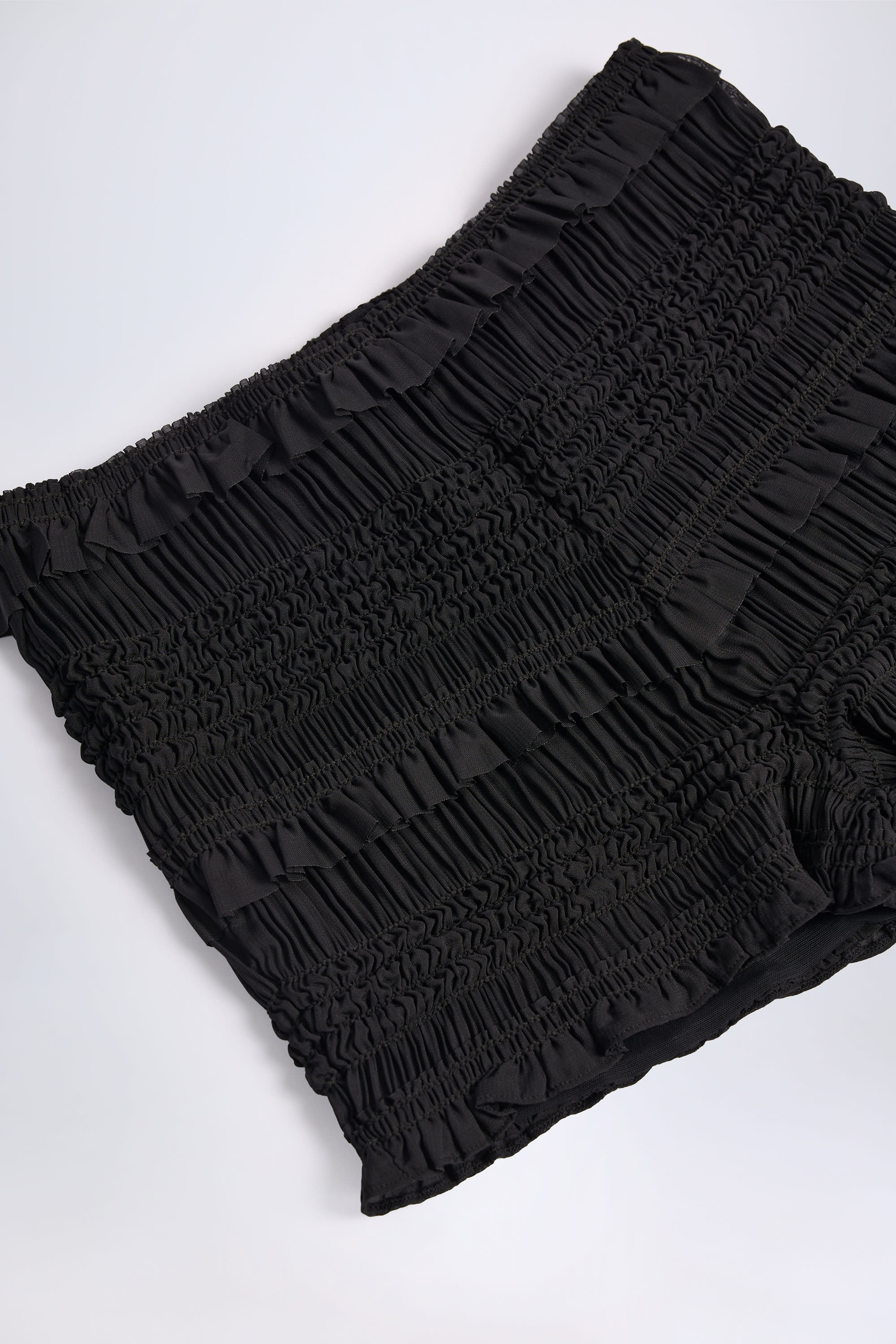 Orla Ruffled Mid-Rise Shorts in Black - Image 5