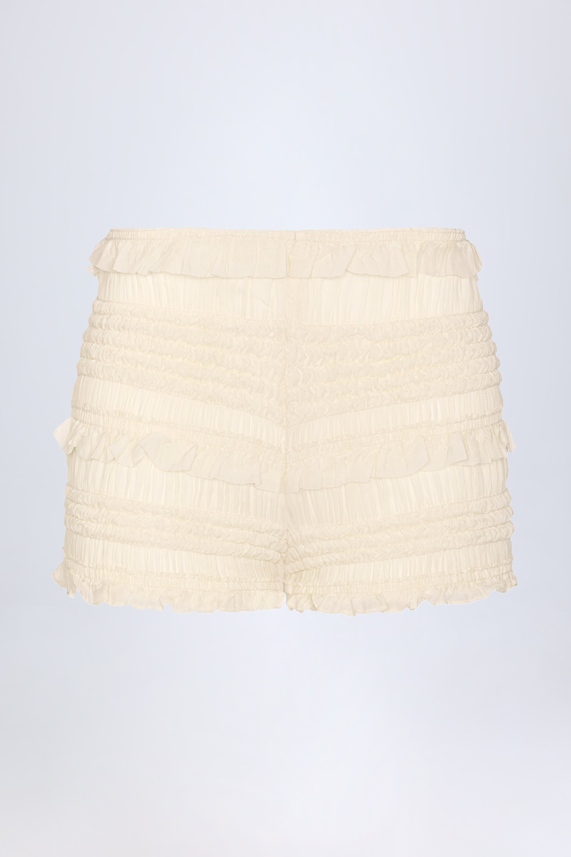 Orla Ruffled Mid-Rise Shorts in Ivory
